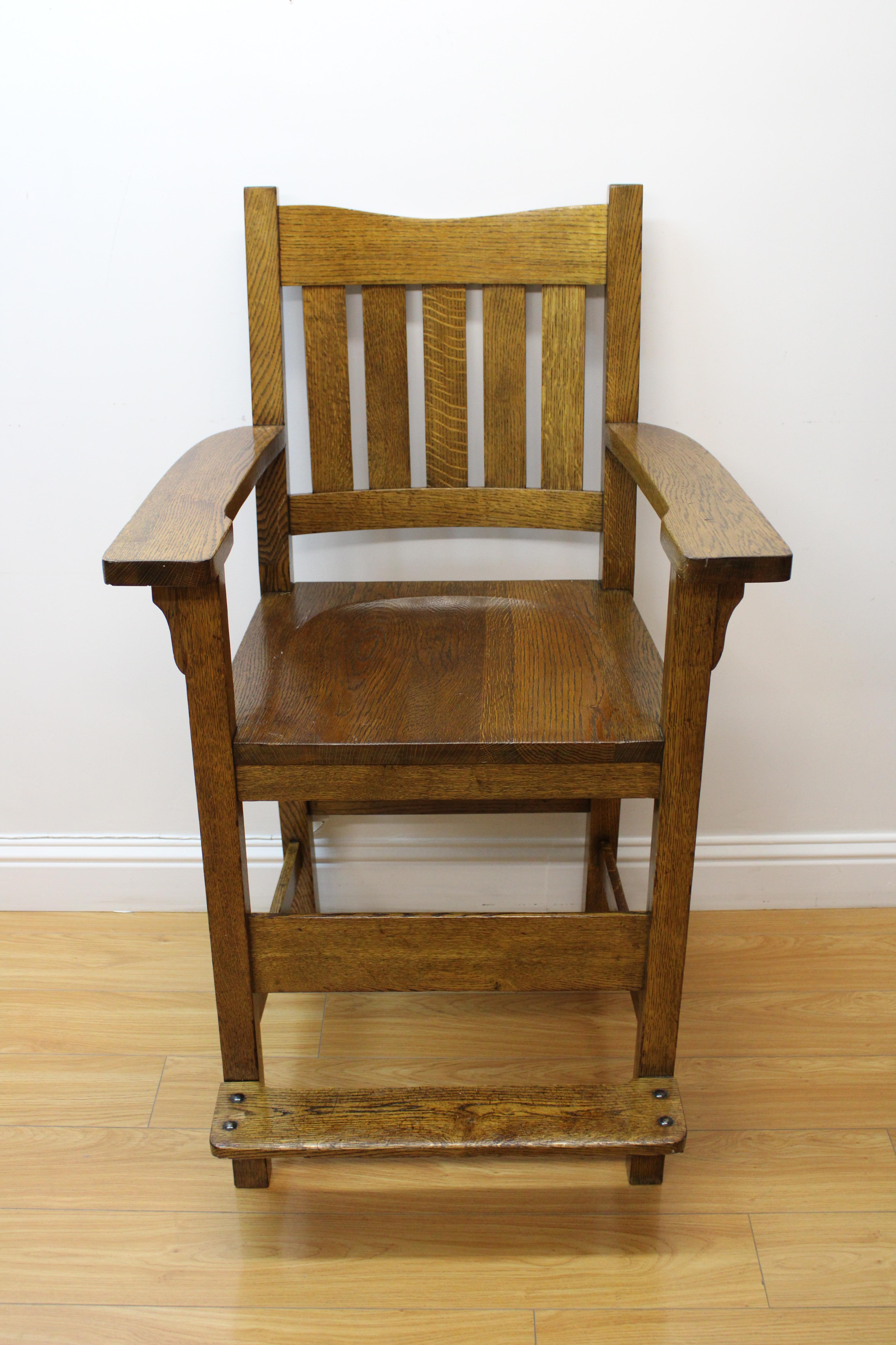 C. 20th Century

Arts & Crafts Oak Tall Arm Chair.