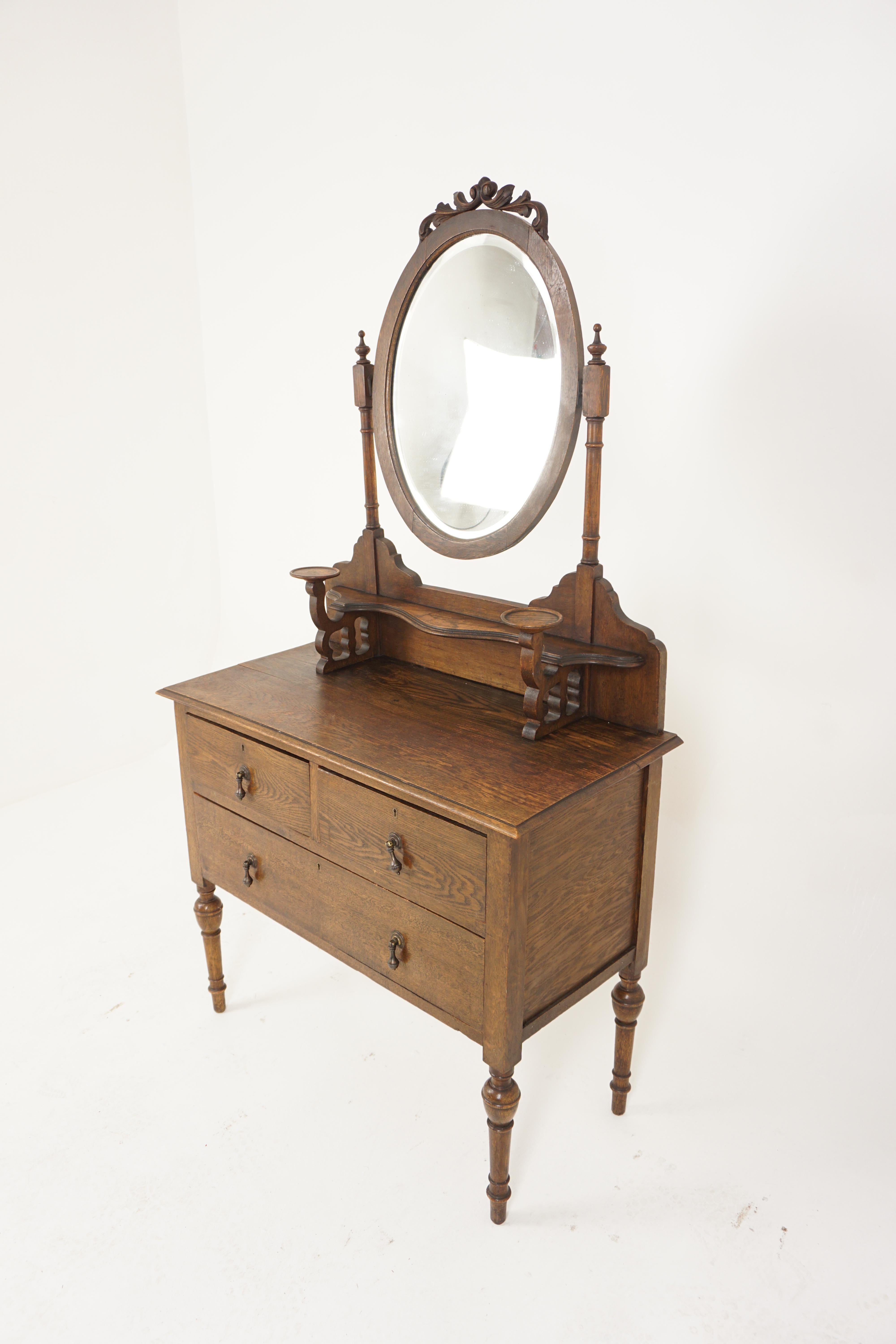 Arts and Crafts oak vanity, dressing chest, chest of drawers, Scotland 1910, H888

Scotland 1910
Solid Oak,
Original Finish
Ornate carving to the top of the oval bevelled mirror
Flanked by a pair of turned supports
Shaped shelf