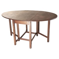 Arts & Crafts oval oak Gate legged table by Architect Charles Spooner