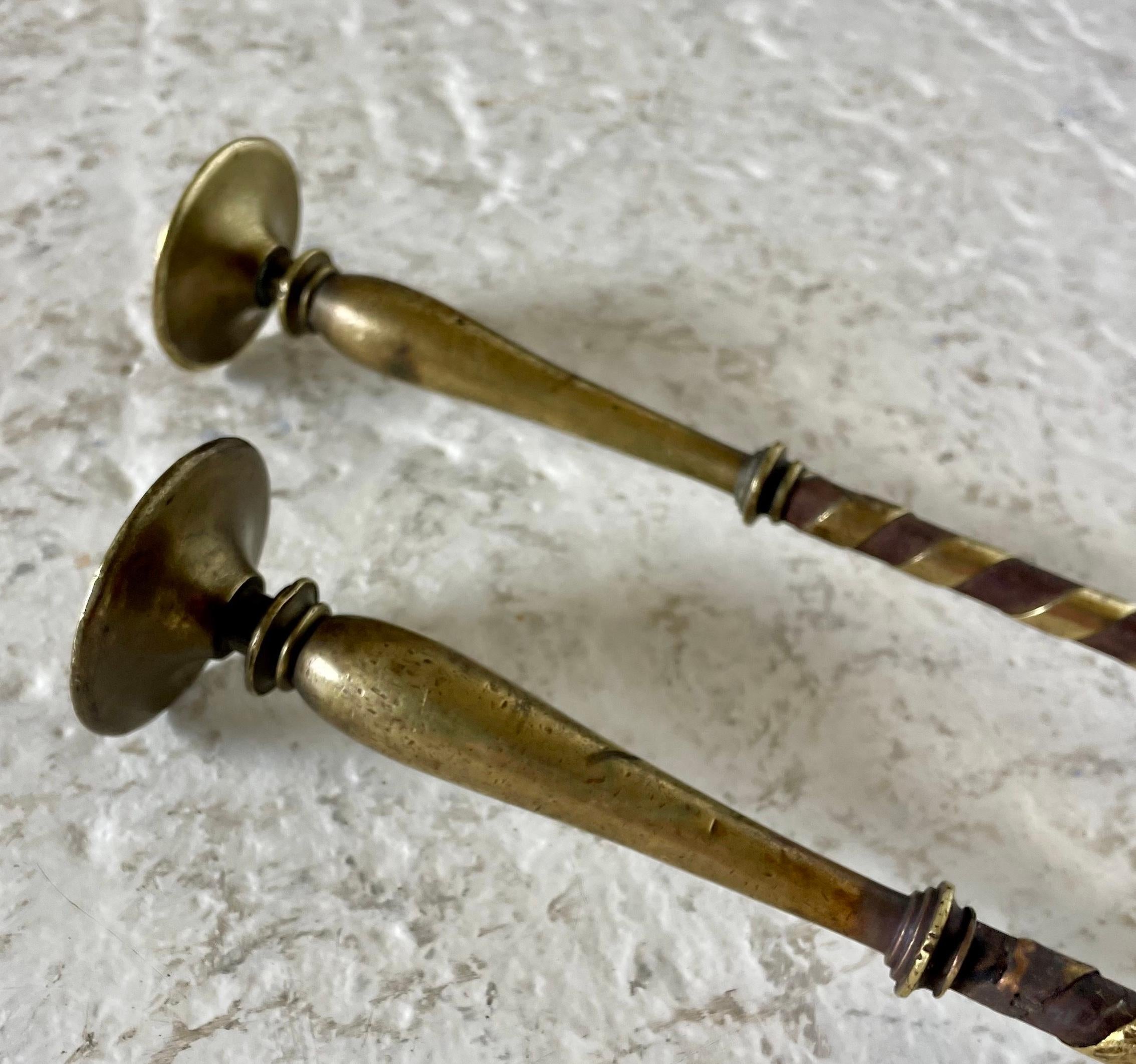 Arts & Crafts pair of fire tools in brass and steel

Consisting shovel and poker with stylised Phoenix decorative handles

In the manner of The Century Guild

Circa 1900

Shovel:  Height 63cm. Width 14cm  Depth 5.5cm

Poker: Height 60cm. Width 5.5cm 