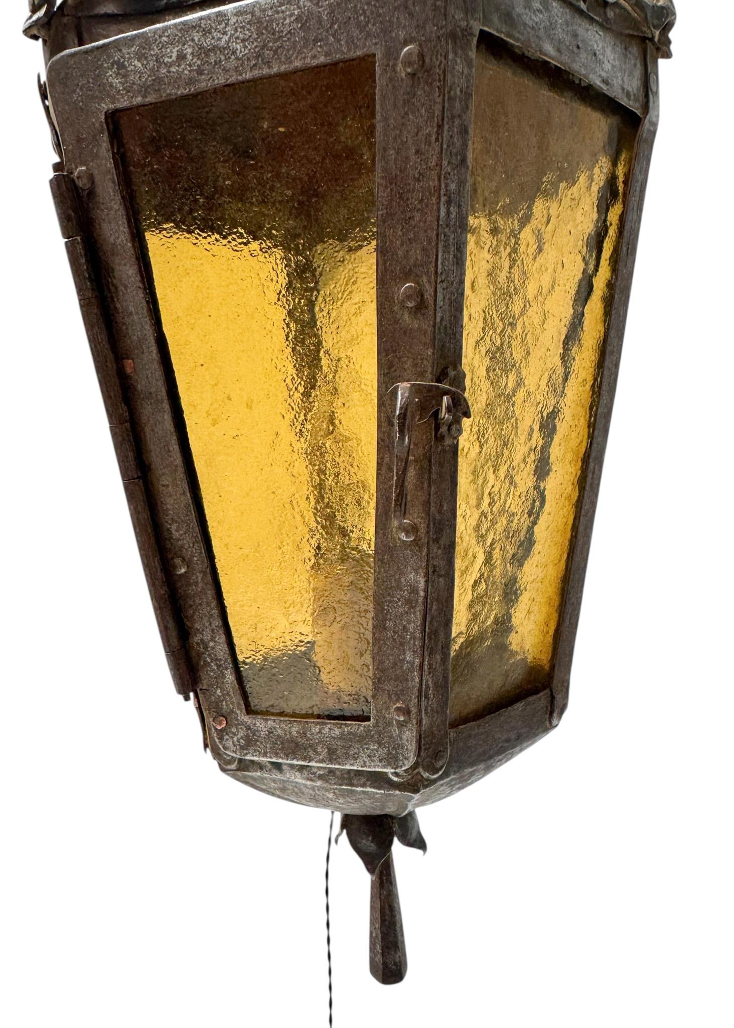 Early 20th Century Arts & Crafts Patinated Wrought Iron Lantern Wall Light or Sconce For Sale