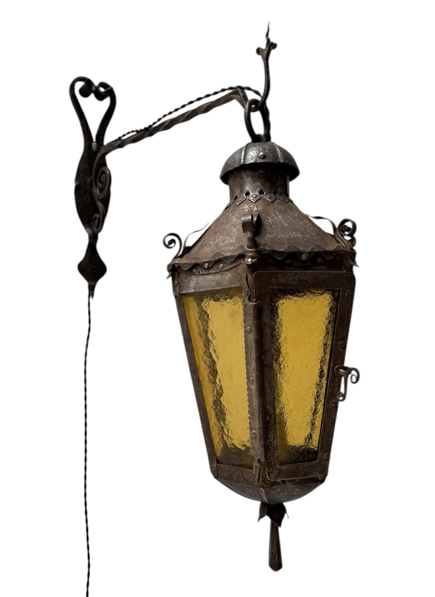 Glass Arts & Crafts Patinated Wrought Iron Lantern Wall Light or Sconce For Sale