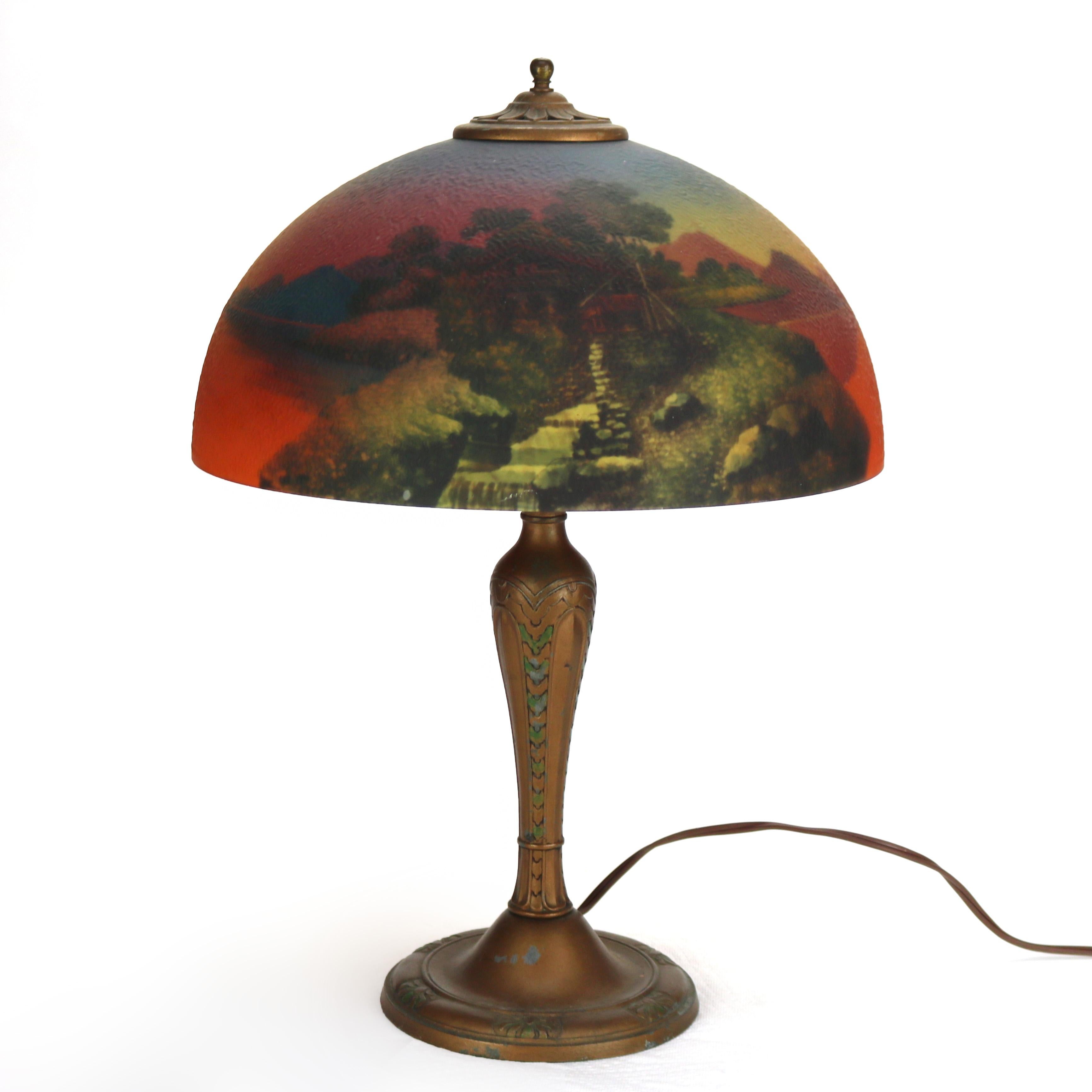 Antique Arts & Crafts Reverse Painted Textured Glass Landscape Scene Double Socket Lamp in the Manner of Phoenix c1920

Measures - 22 1/2
