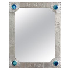 Arts & Crafts Polished Pewter Wall Mirror with Enameled "cabochons" England 1926