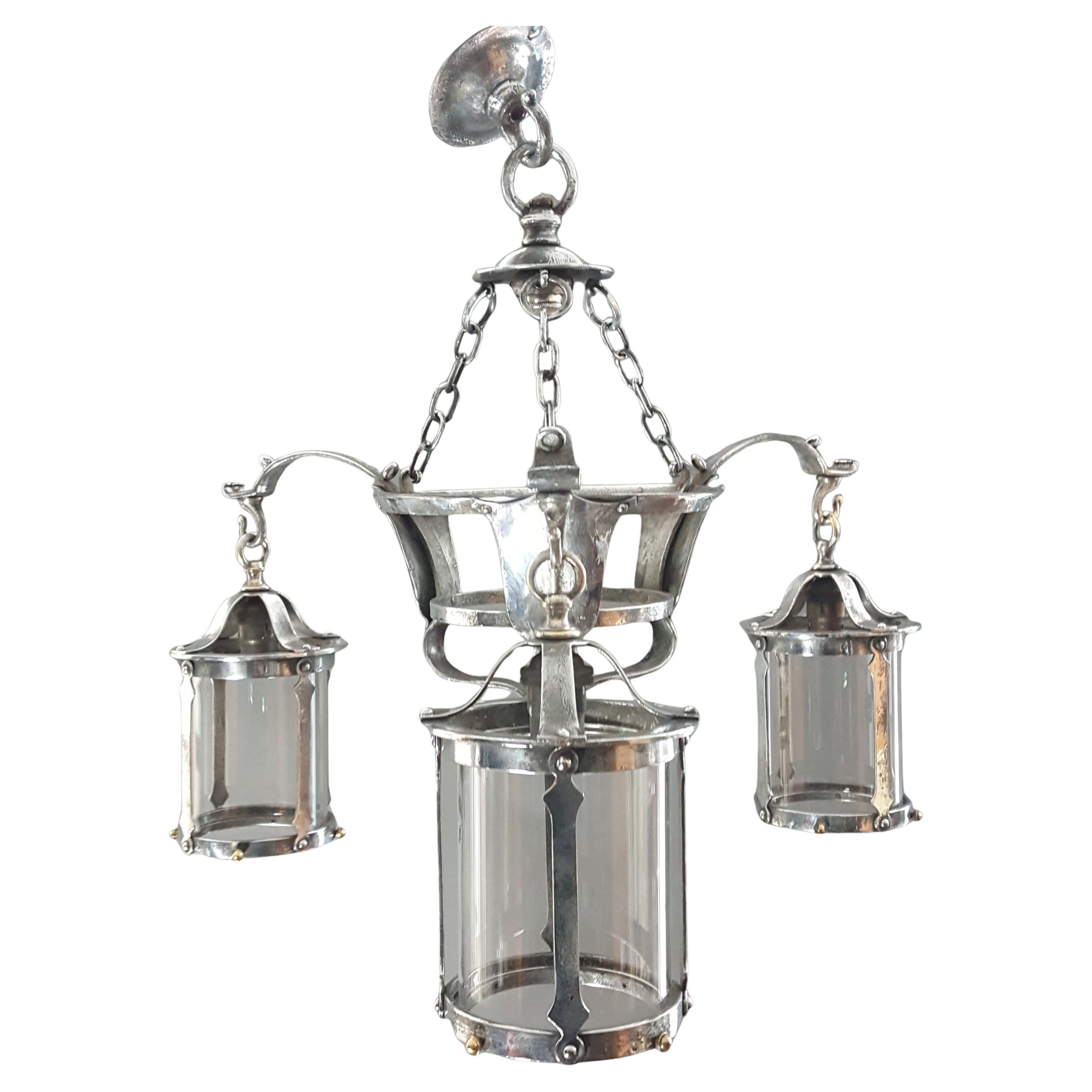 Arts & Crafts polished steel chandelier
