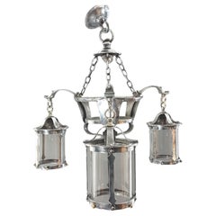 Antique Arts & Crafts polished steel chandelier