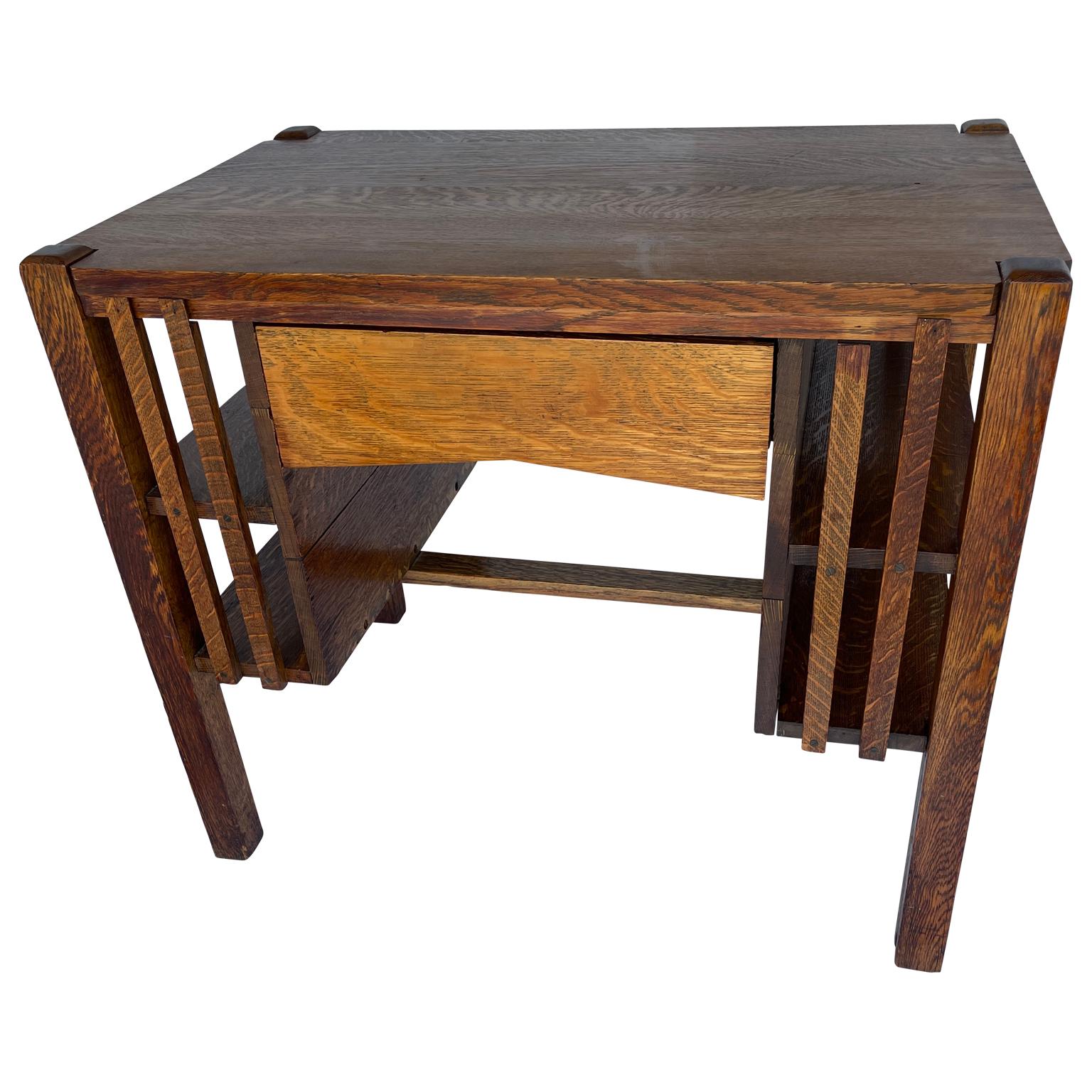 Arts and Crafts Quarter Mission Oak Desk. This beautiful Arts and Crafts era desk Mission style furniture originated in the late 19th century. The Mission desk emphasizes simple horizontal and vertical lines and flat panels that accentuate the grain