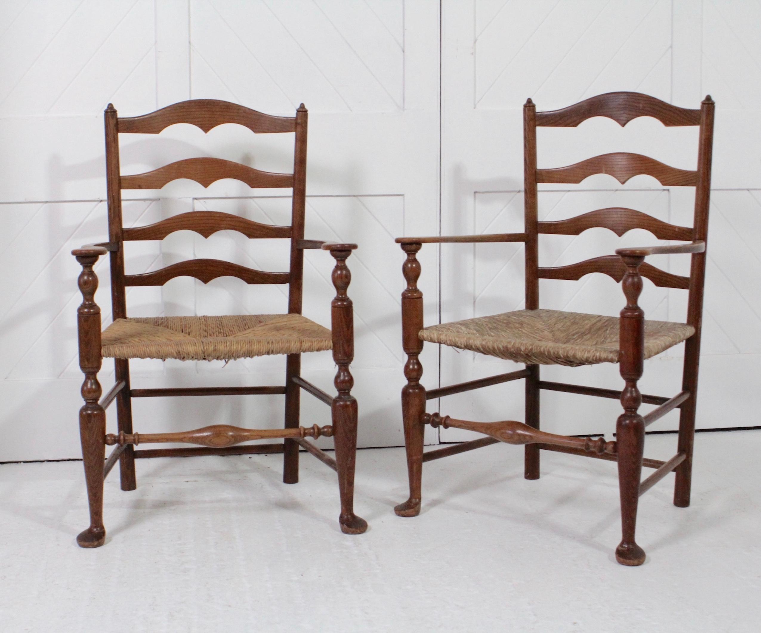 Arts & Crafts rare pair of ladder back oak armchairs
With rush seats
By Sir Edwin Landseer Lutyens
Circa 1902

Height 98cm Width 61cm Depth 50cm

