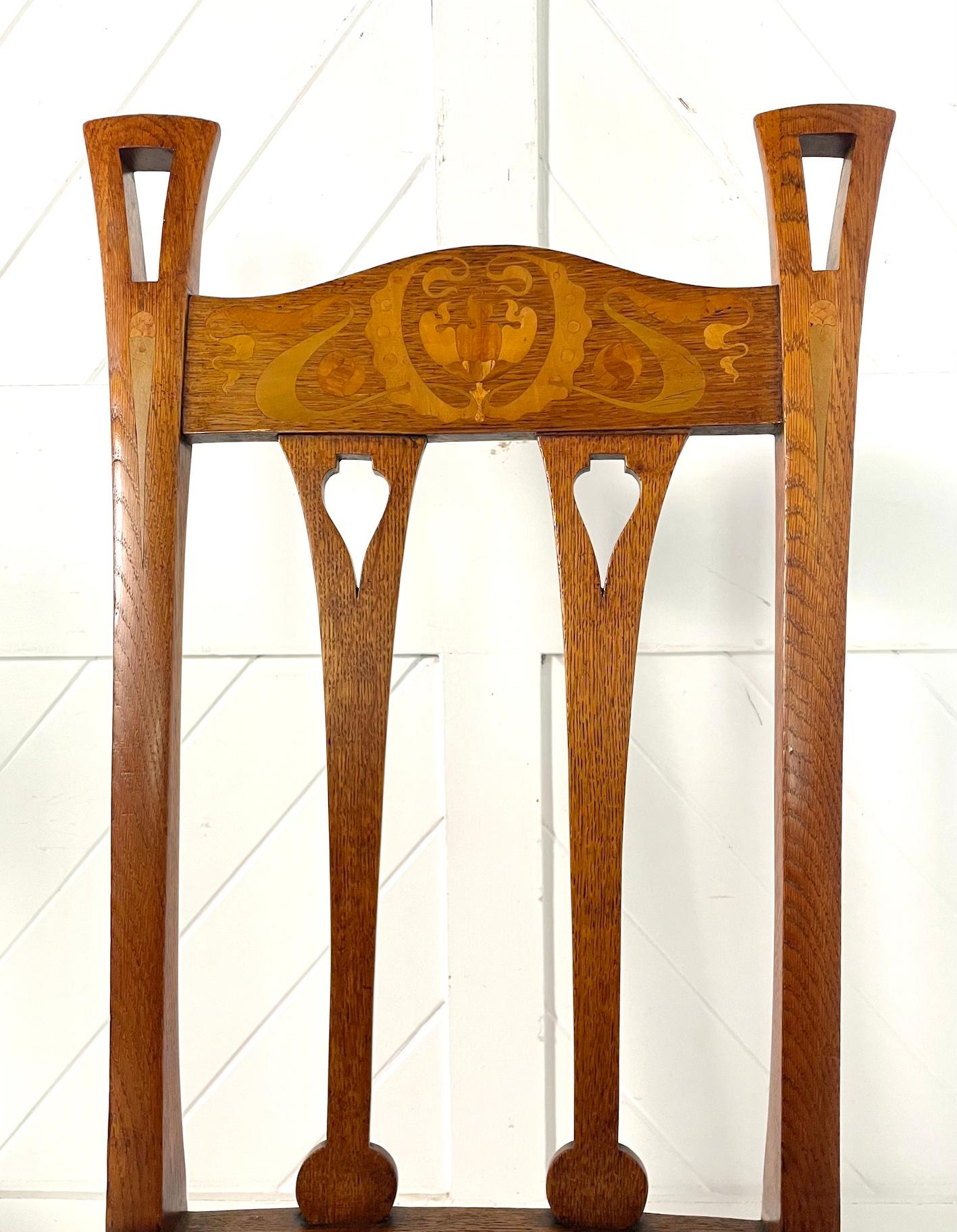 Arts & Crafts set of 6 inlaid oak dining chairs

Stylised inlay floral decoration with pierced uprights and drop-in upholstered seats

Hampton & Sons of Pall Mall

Circa 1900

Height. 104cm Width. 46cm Depth. 55cm

Seat Height 45cm