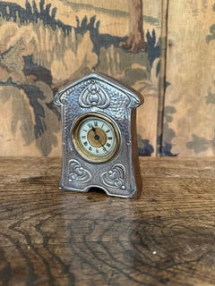 Arts & Crafts small silver clock