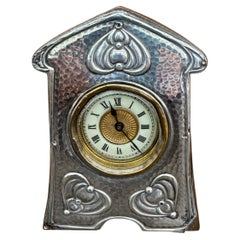 Arts & Crafts small silver clock