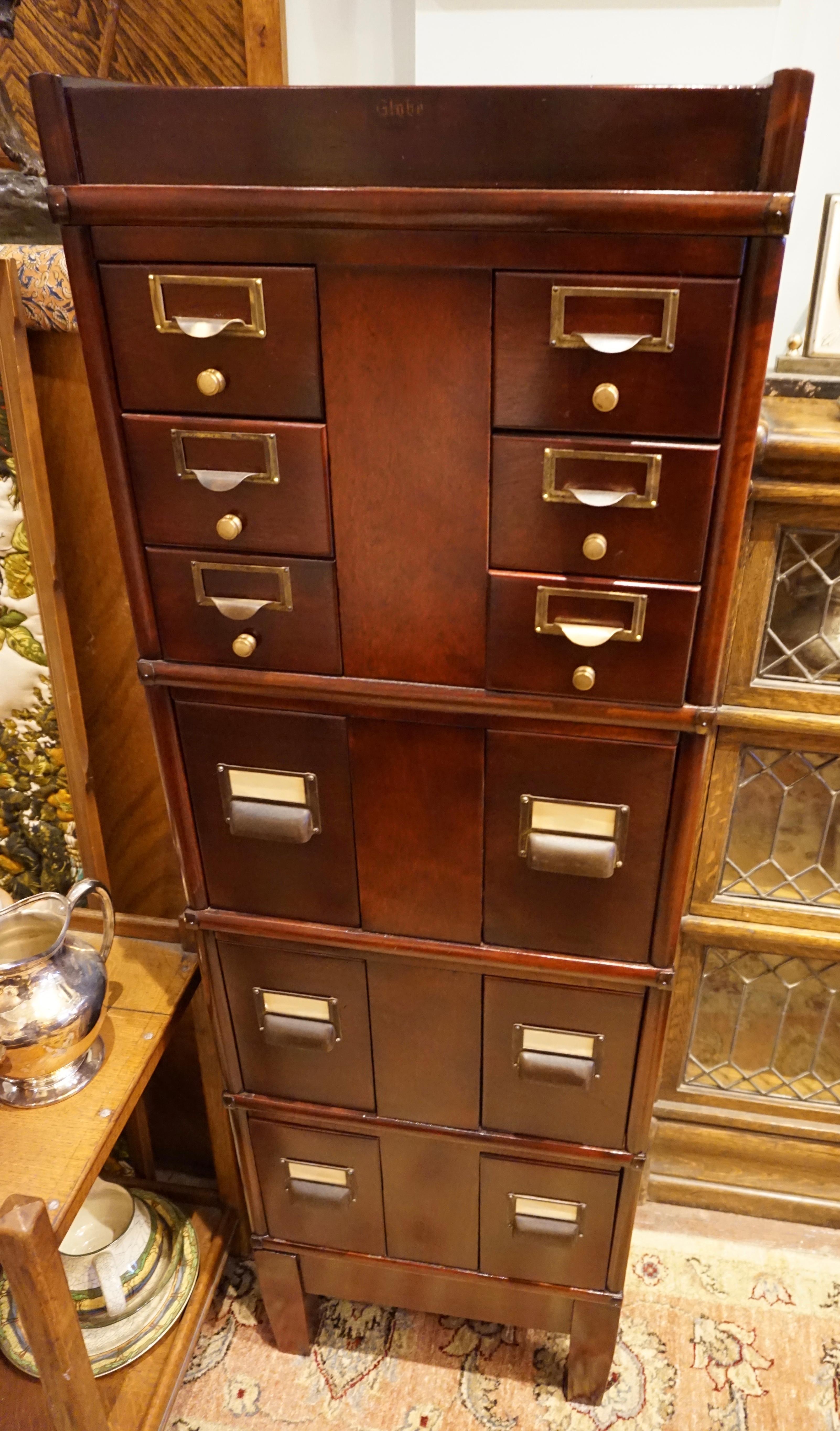 globe filing cabinet antique