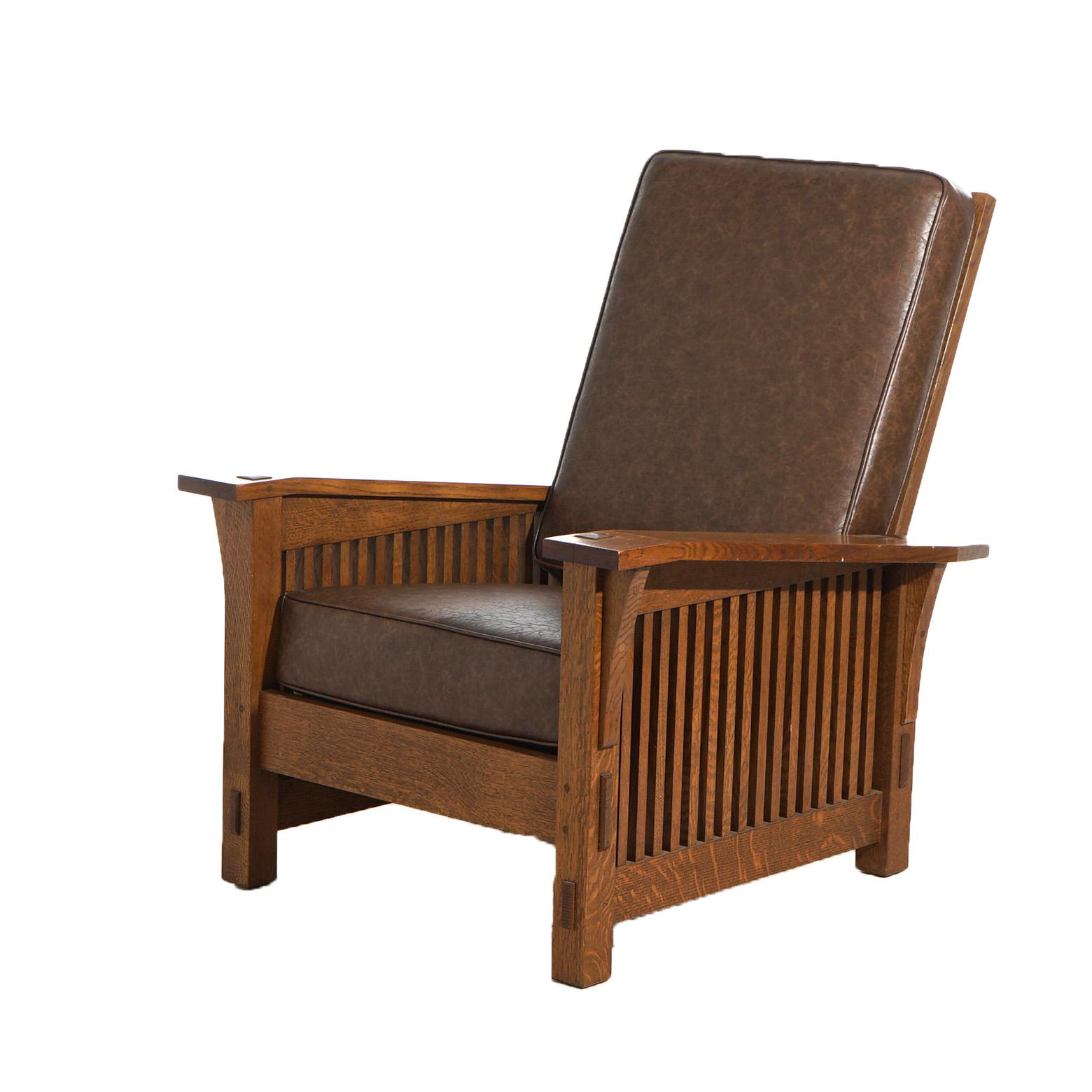 ***Ask About Reduced In-House Delivery Rates - Reliable Professional Service & Fully Insured***

An Arts & Crafts Stickley Tapered Arm Oak Morris Chair with Slat Sides 20th C

Measures - 41.5