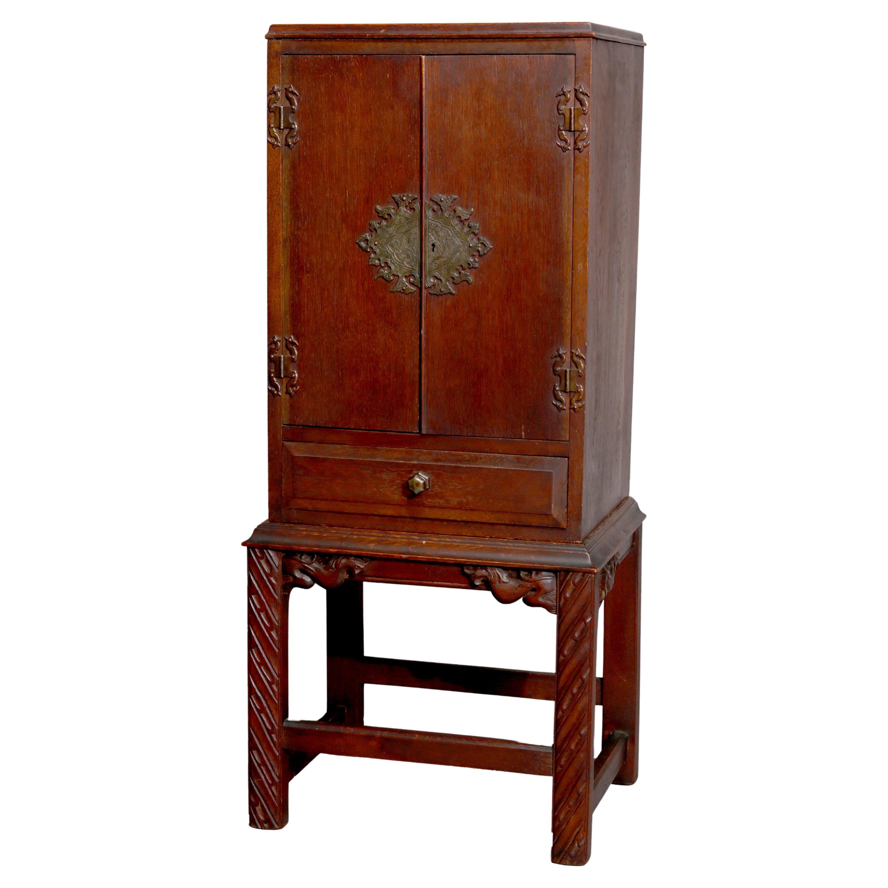 Arts & Crafts Style Carved Oak Cellaret with Figural Cast Phoenix Hardware C1910