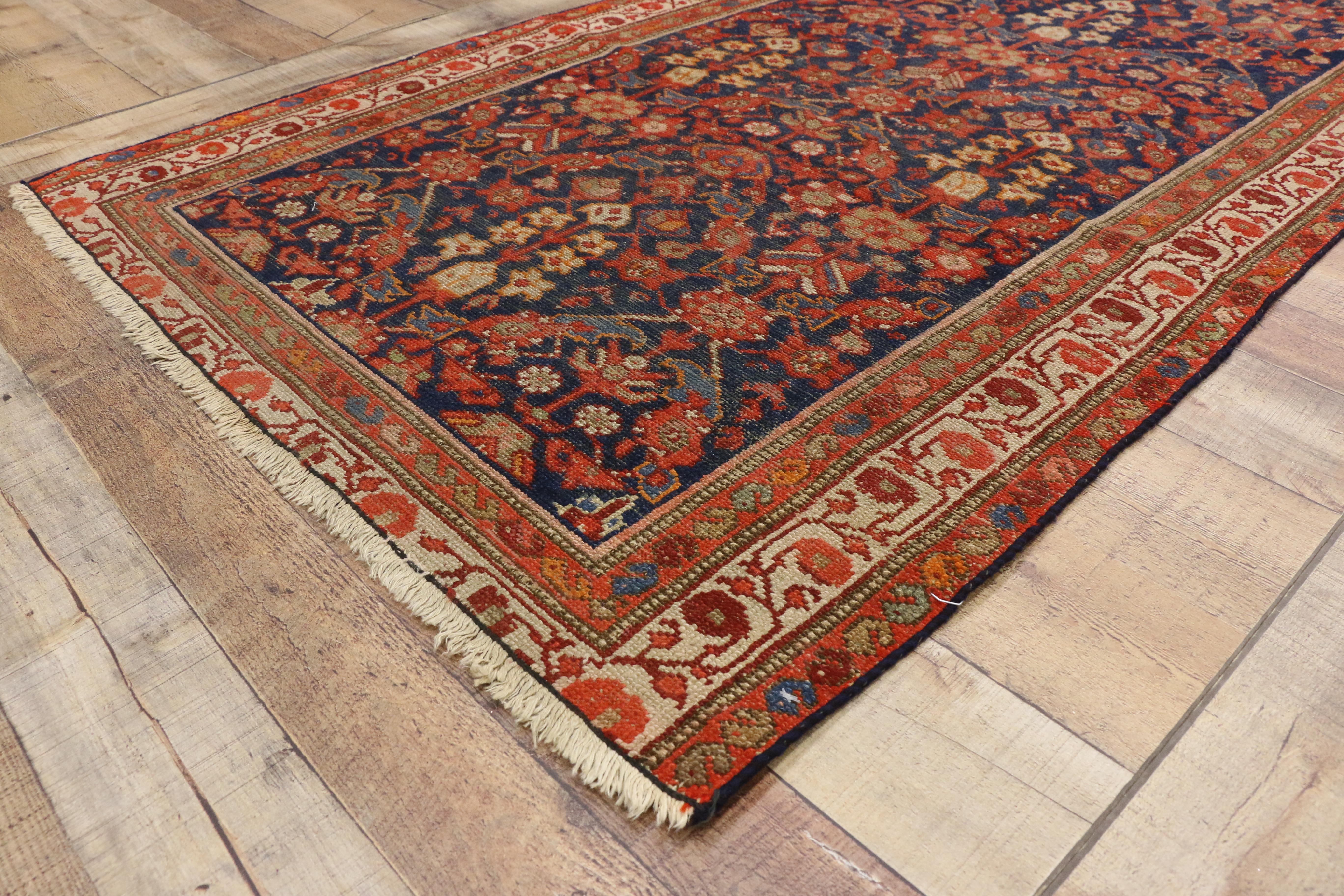 73482 Arts & Crafts style distressed antique Persian Malayer runner, hallway runner. Richly ornamented and brilliantly hued, this hand-knotted wool antique Persian Malayer runner features a timeless, traditional style composed of the Guli Henna