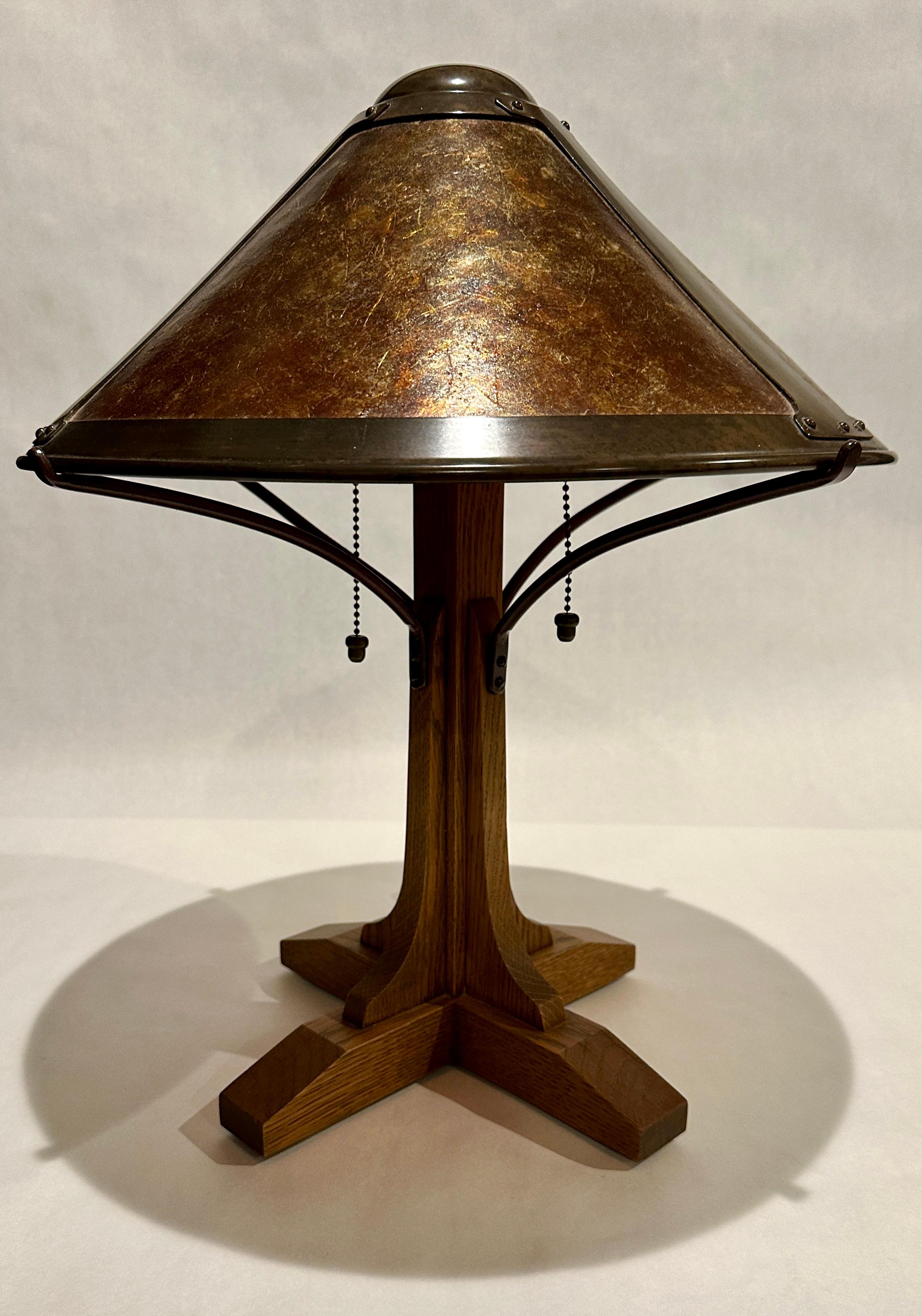 
An exceptional Stickley style Arts & Crafts table lamp, produced and stamped by Warren Hile Studio, Sierra Madre CA. Base from solid oak, an 
