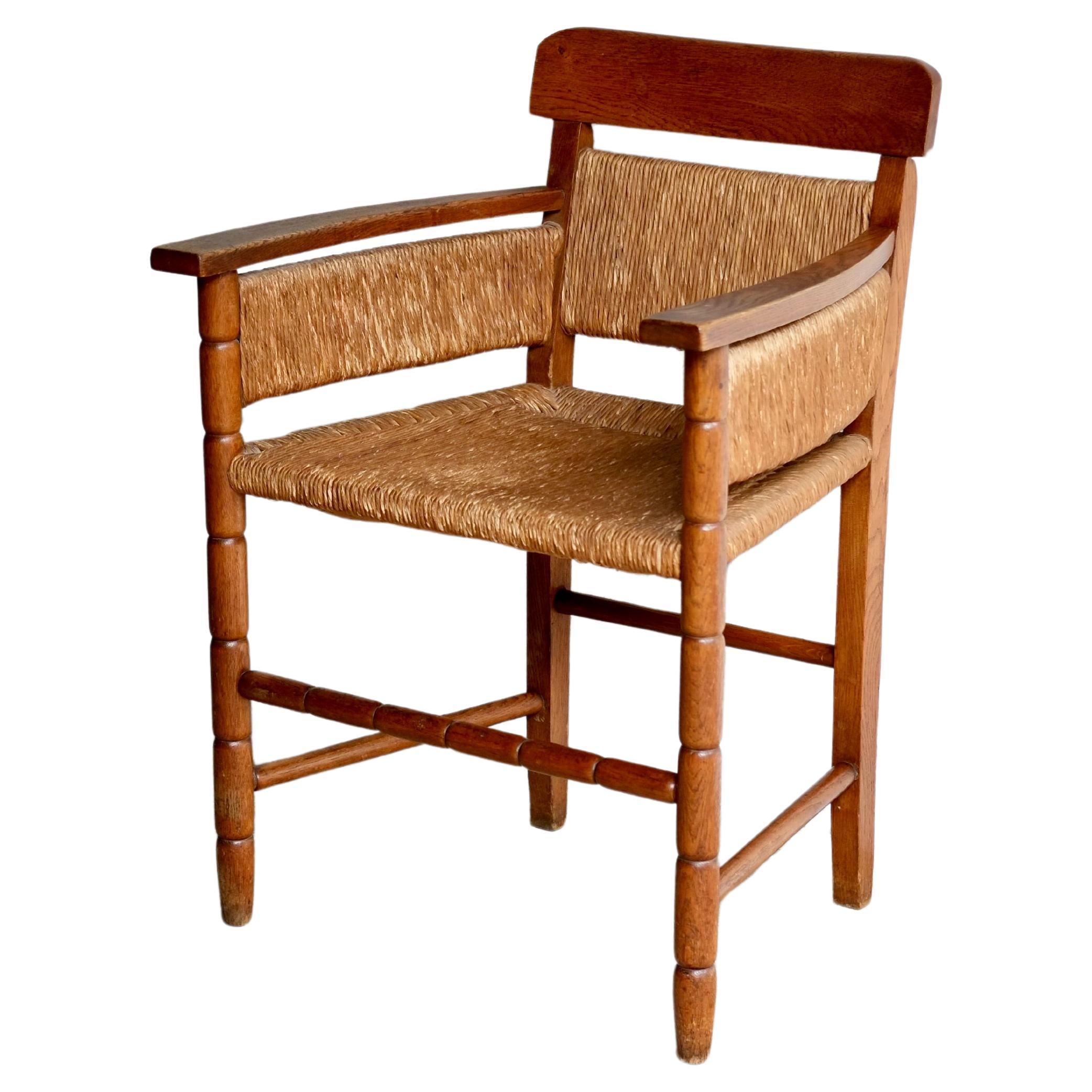 Arts & Crafts Style Oak & Rush Armchair For Sale