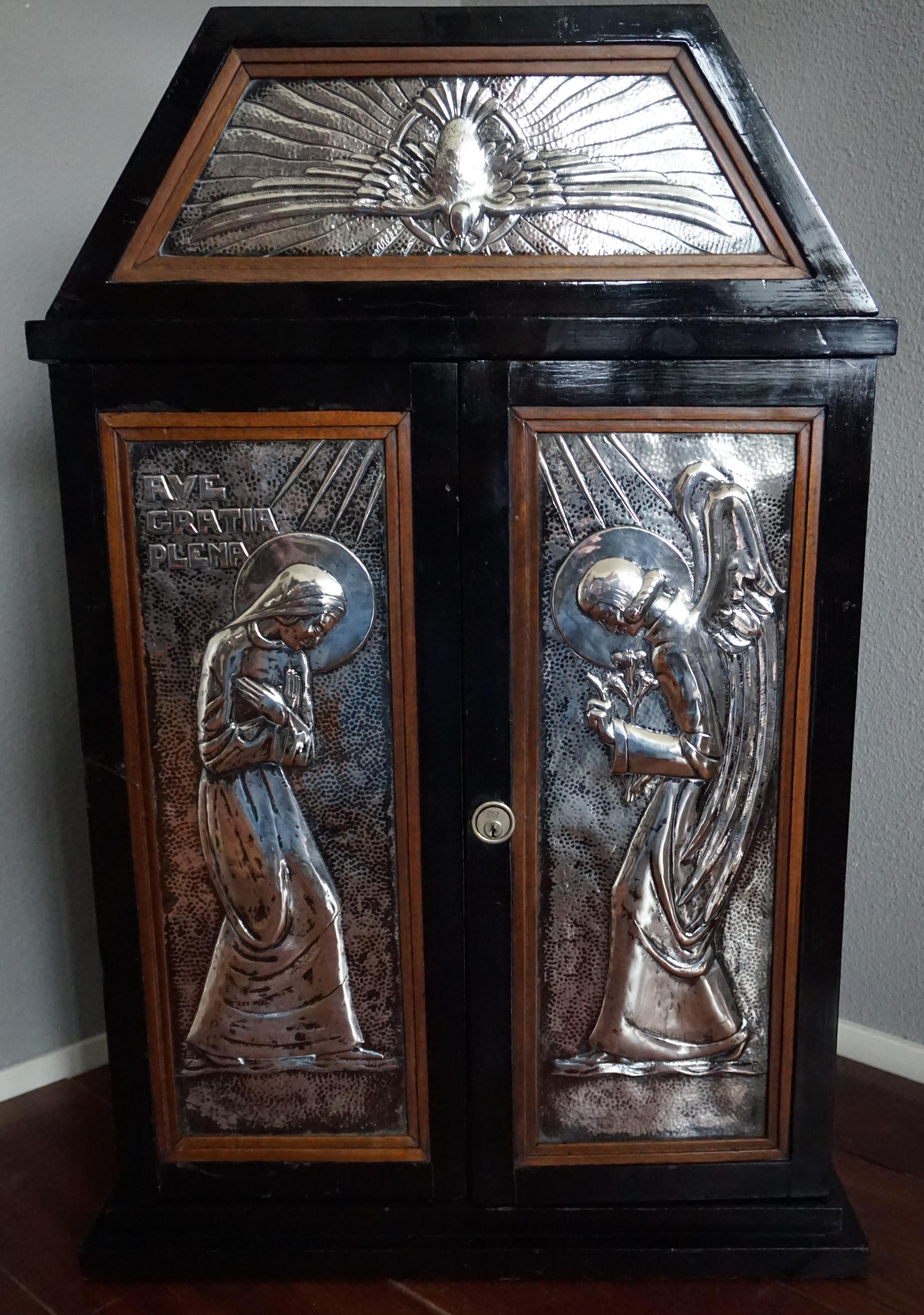 Religious artefact with stunning embossed and inlaid silver plaques.

Antique tabernacles are a rare find, so when we got the chance to purchase this early 20th century example we did not think twice. Especially, because of the stunning and sterling