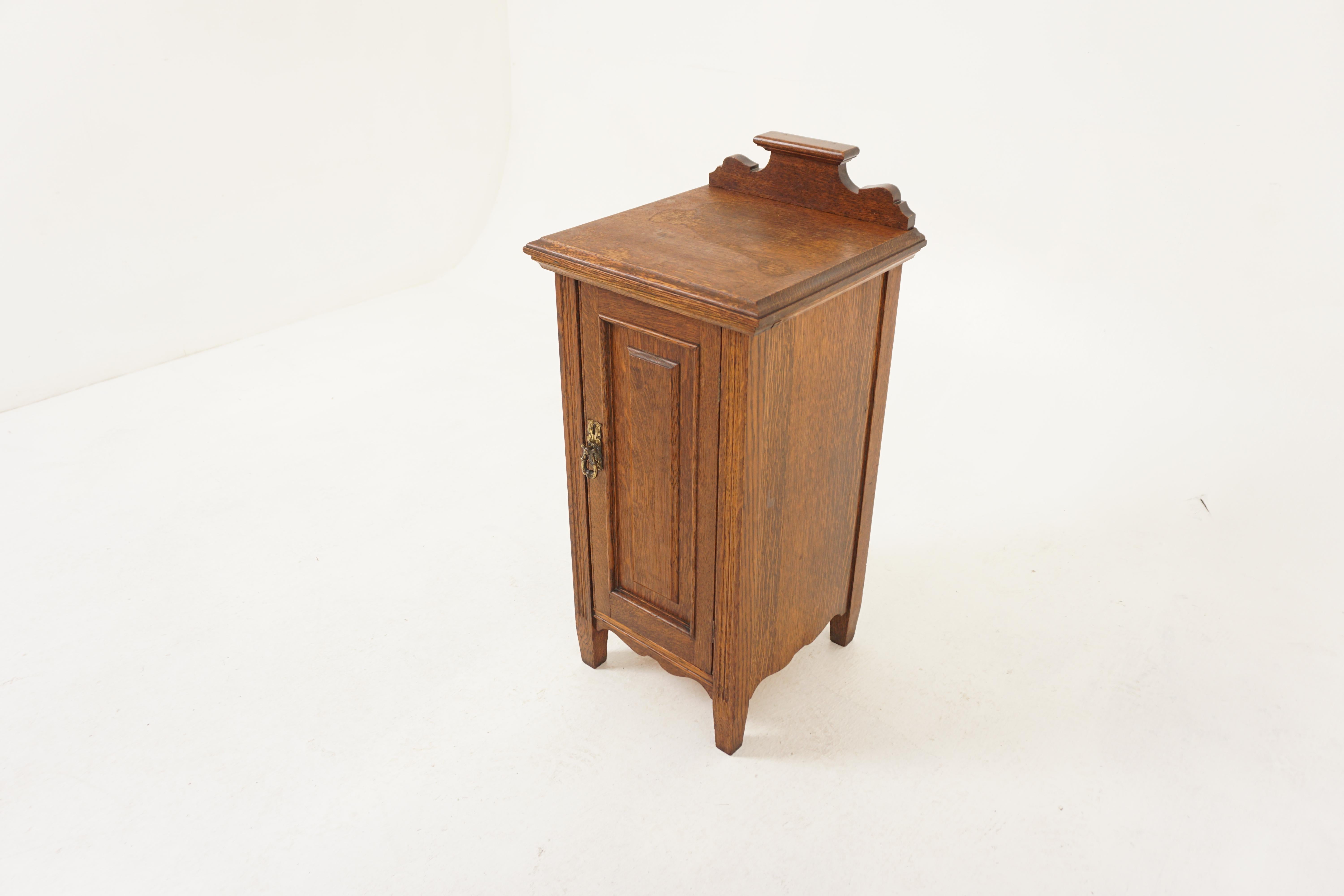 Arts & Crafts Tiger Oak Nightstand, Bedside, Lamp Table, Scotland 1900, H1187

Scotland 1900
Solid Oak
Original finish
Carved pediment on top
Panelled door with original brass pull
Opens to reveal single shelf (not original)
Raised on tapering