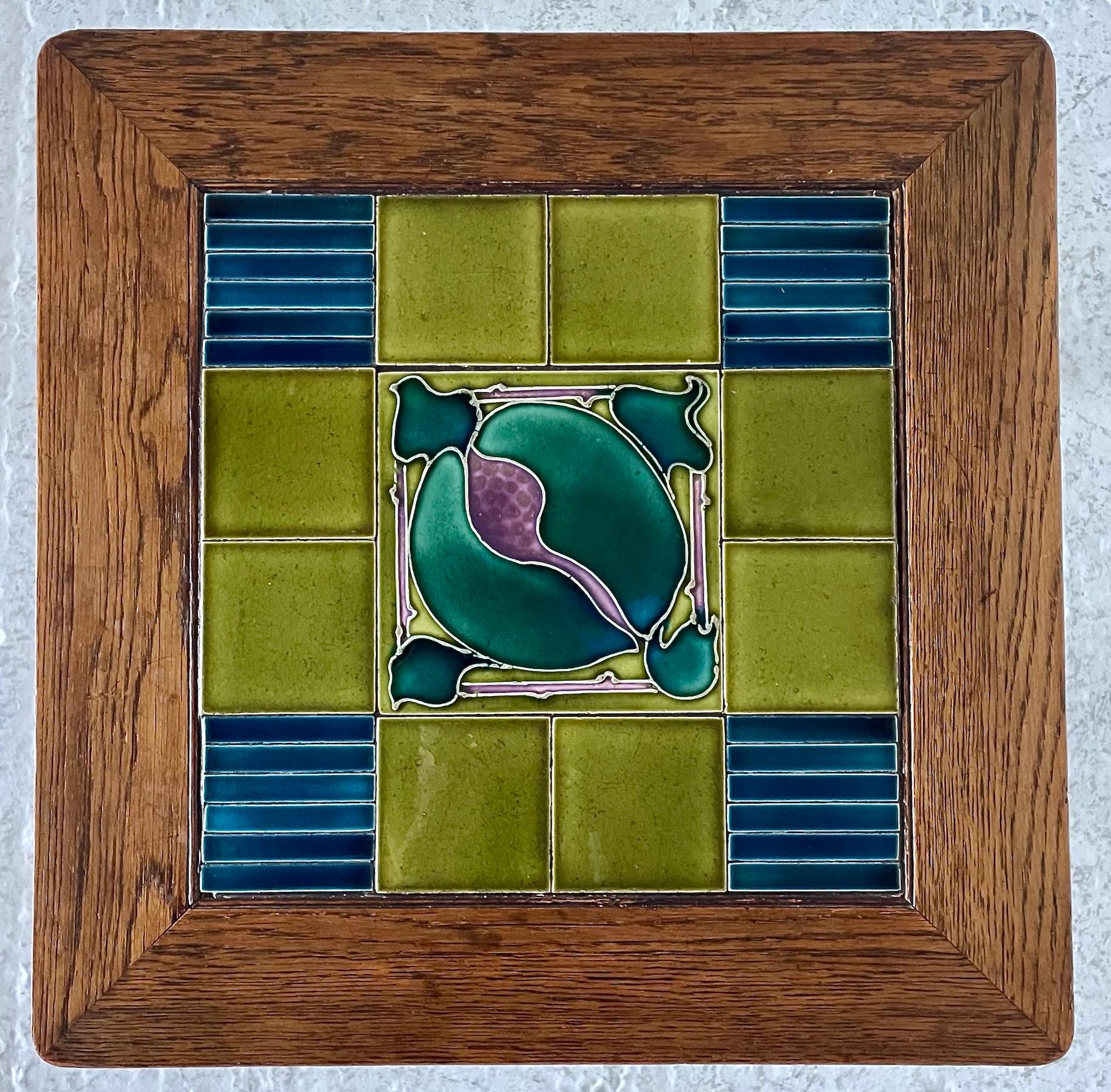 Arts & Crafts tile top table, deep panelled sides with yin-yang, cut-out decoration raised on four square, tapering to turned legs.

Attributed to Wylie & Lochhead, Glasgow

Circa 1900

Height 72.5cm

Width 45.5 cm

Depth 45.5cm
