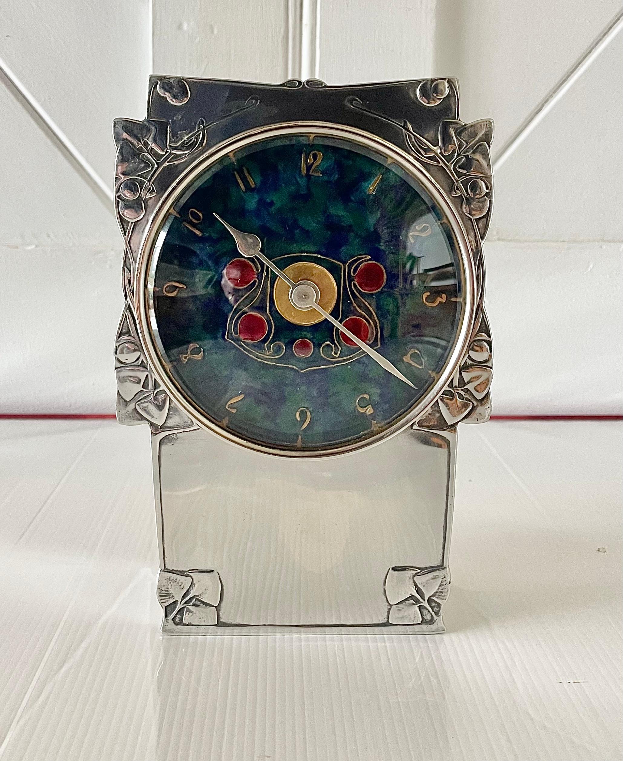 Iconic and rare Arts & Crafts pewter clock

With enamel face and stylised ‘Celtic’ metalwork

‘Tudric’ No 0609

Designed by Archibald Knox

For Liberty & Co

Circa 1900

Height 20cm. Width 14cm. Depth 8cm