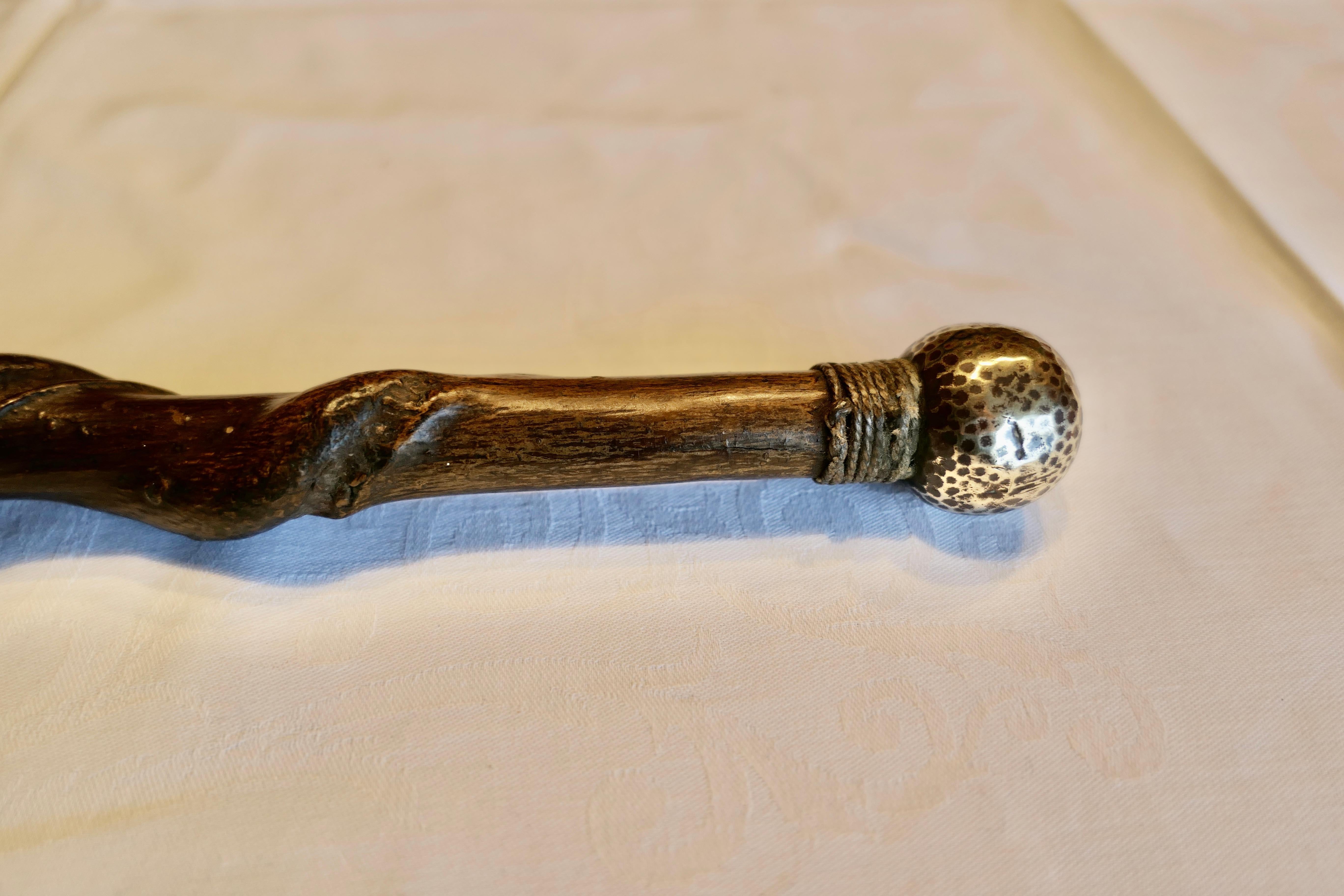 Arts & Crafts twisted walking cane with beaten brass handle

This charming twisted cane is in the Arts and Crafts tradition with beaten brass Knob at the handle which has a rope collar, it is in good antique condition consistent with age.

The