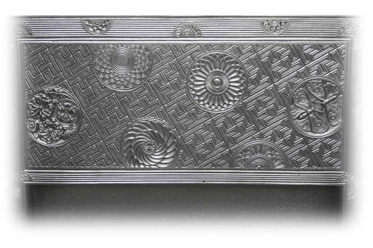 Rare and large late Victorian Arts & Crafts cast iron grate designed by the British architect Thomas Jeckyll (1827-1881) and produced by Barnard Bishop & Barnard foundry Norwich, circa 1880. 

This style of grate was advertised in the late 19th
