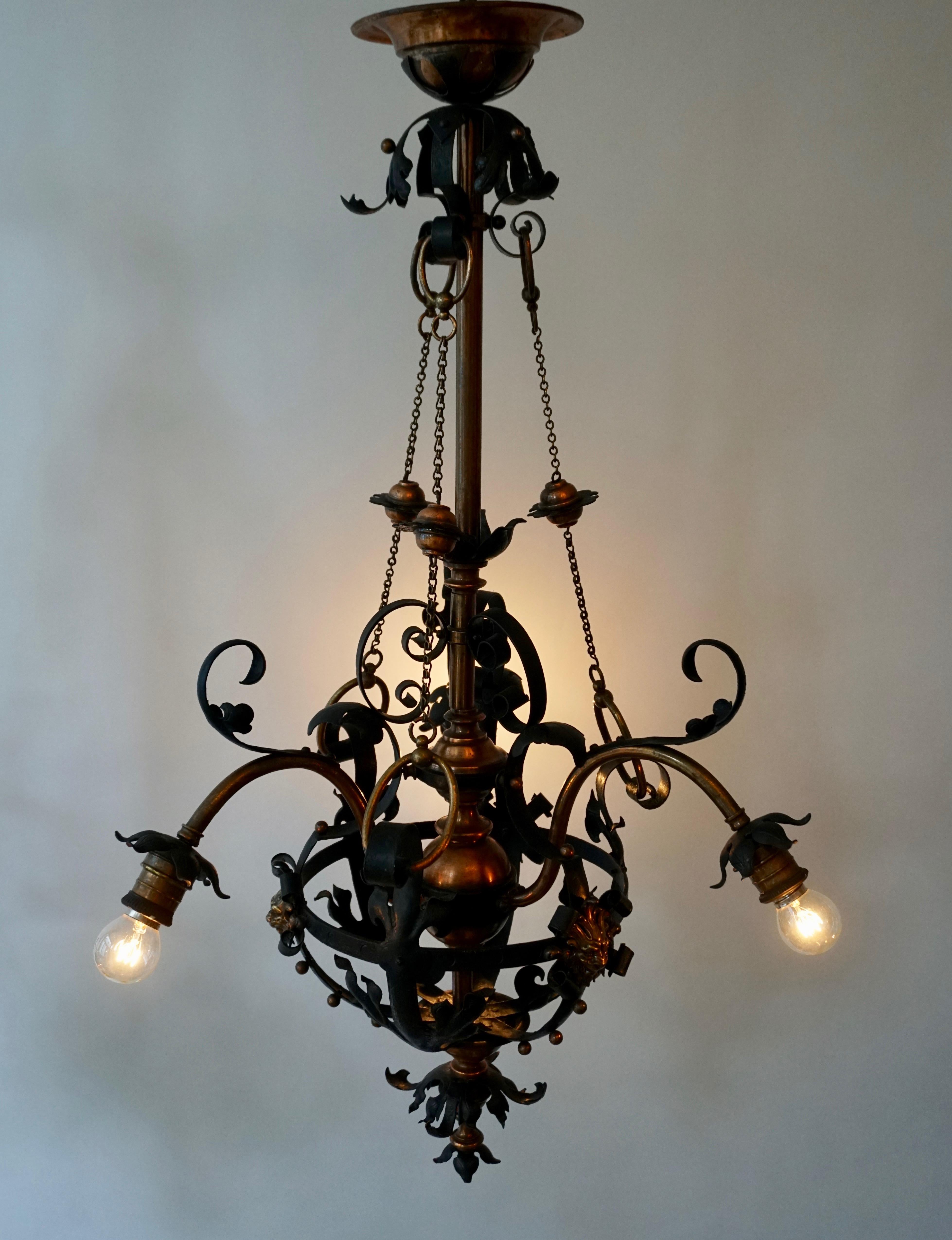 Arts & Crafts Wrought Iron and Copper Castle Chandelier with Bronze Lion Heads For Sale 1