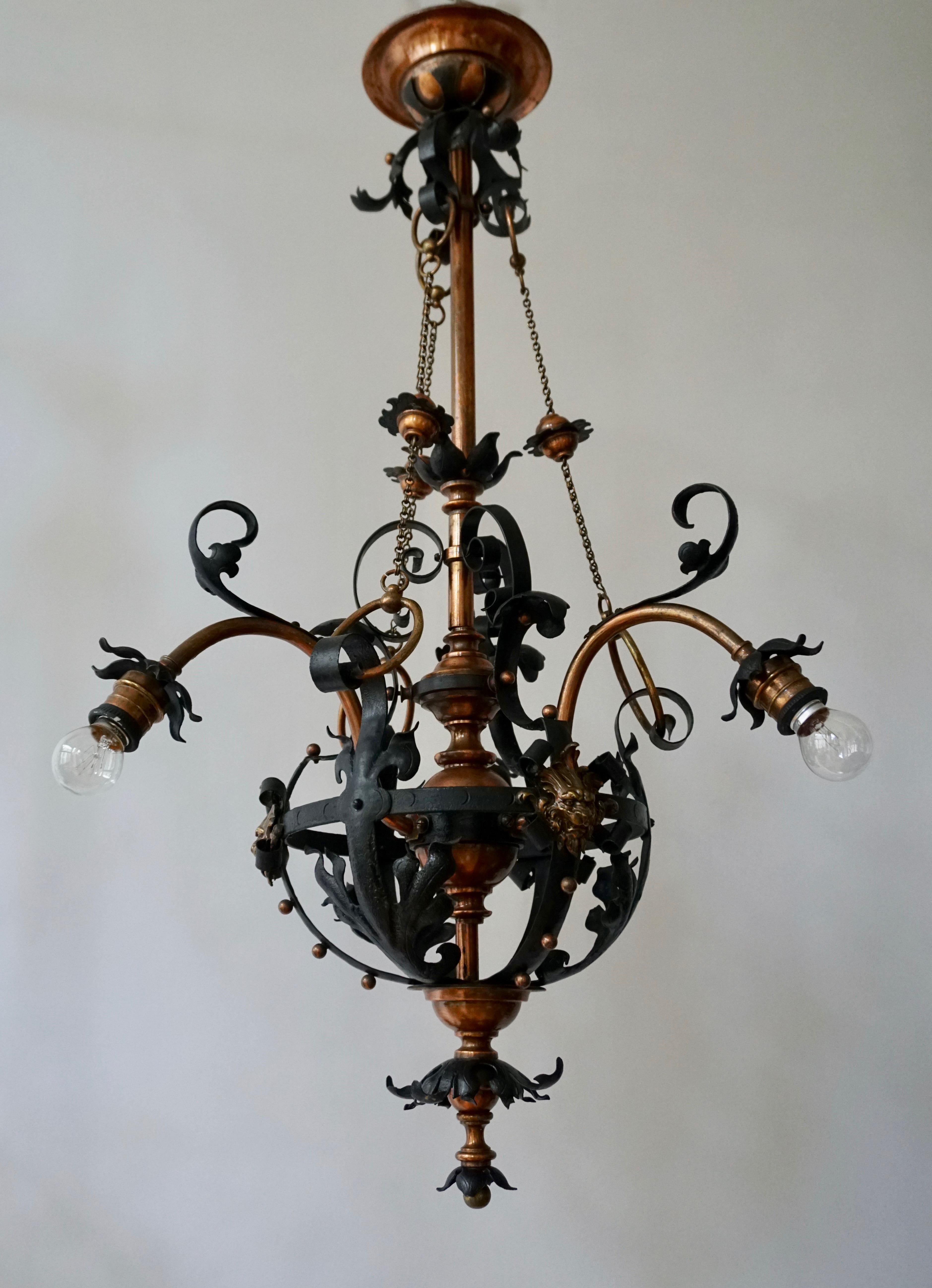 Arts & Crafts Wrought Iron and Copper Castle Chandelier with Bronze Lion Heads For Sale 3