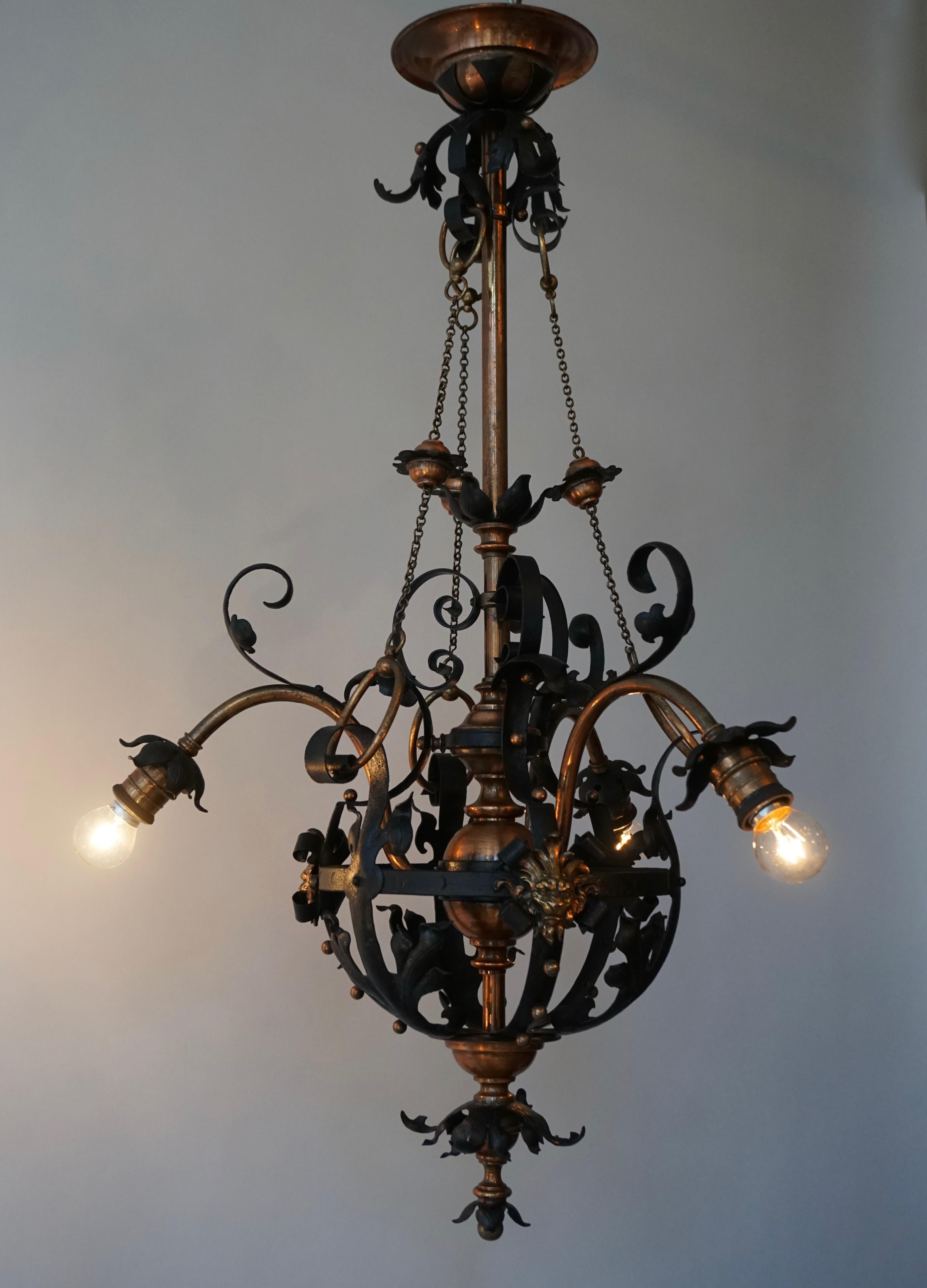 Arts & Crafts Wrought Iron and Copper Castle Chandelier with Bronze Lion Heads For Sale 4
