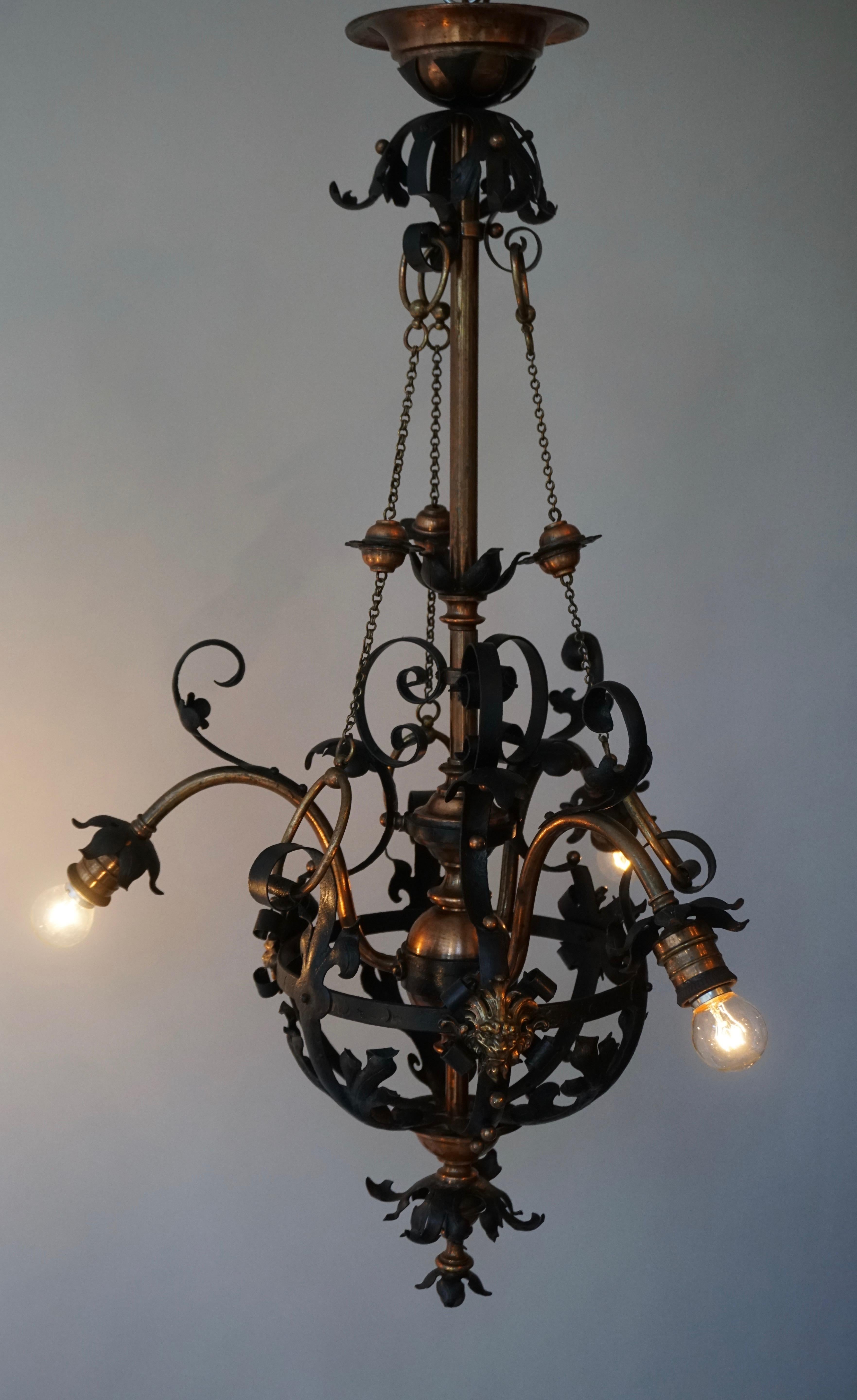 Arts & Crafts Wrought Iron and Copper Castle Chandelier with Bronze Lion Heads For Sale 5