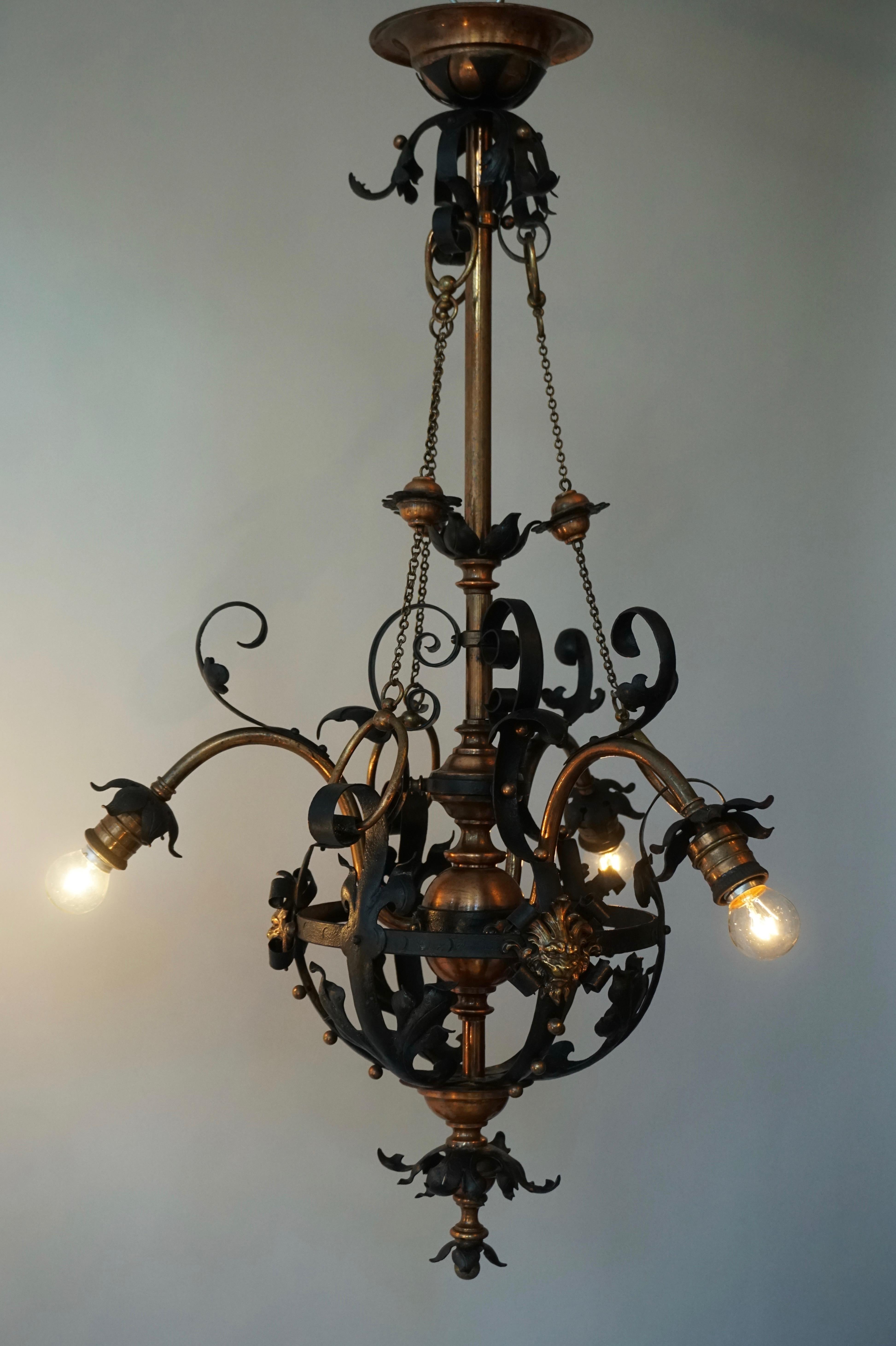 Arts & Crafts Wrought Iron and Copper Castle Chandelier with Bronze Lion Heads For Sale 7