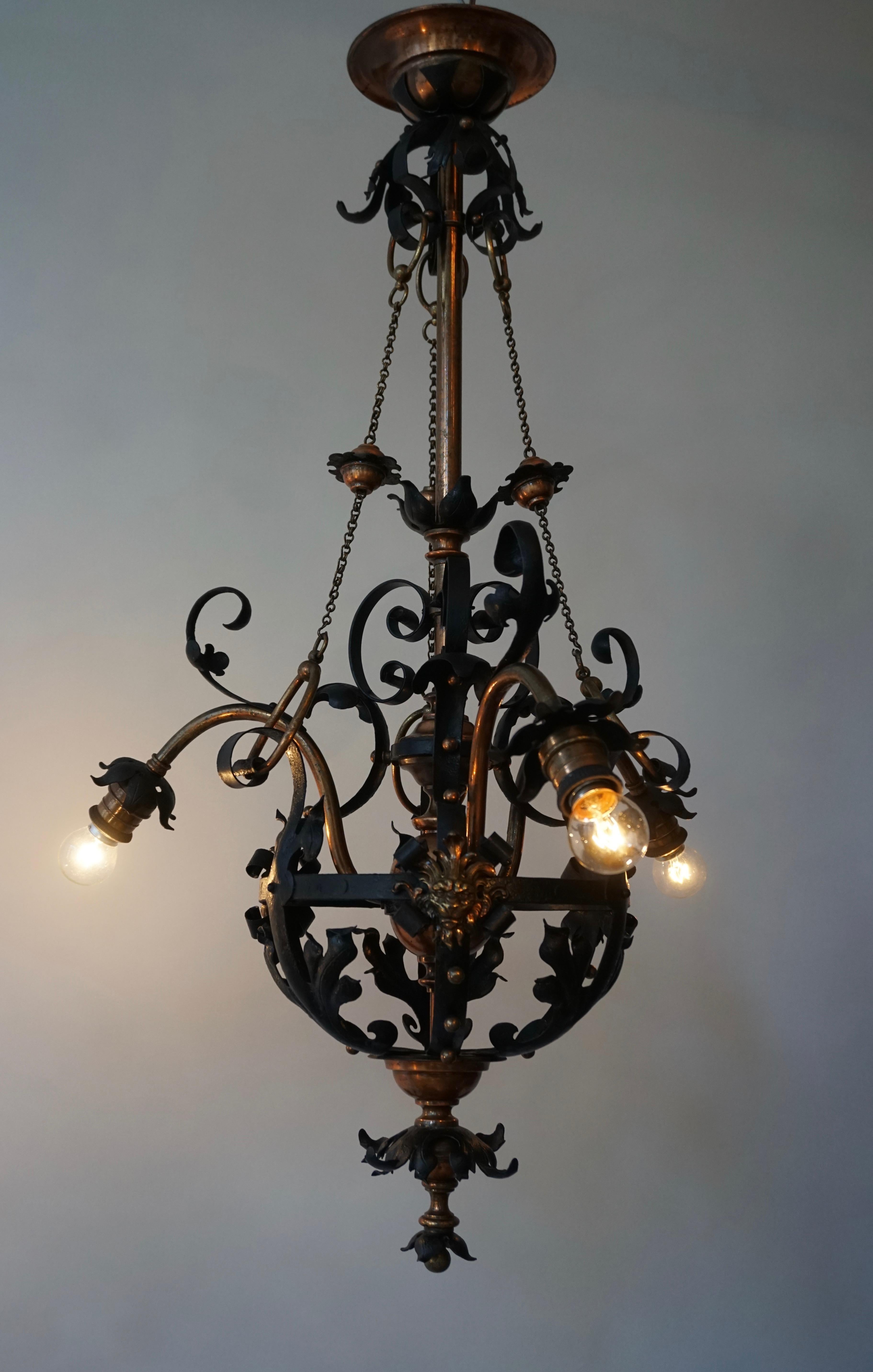 Arts & Crafts Wrought Iron and Copper Castle Chandelier with Bronze Lion Heads For Sale 8