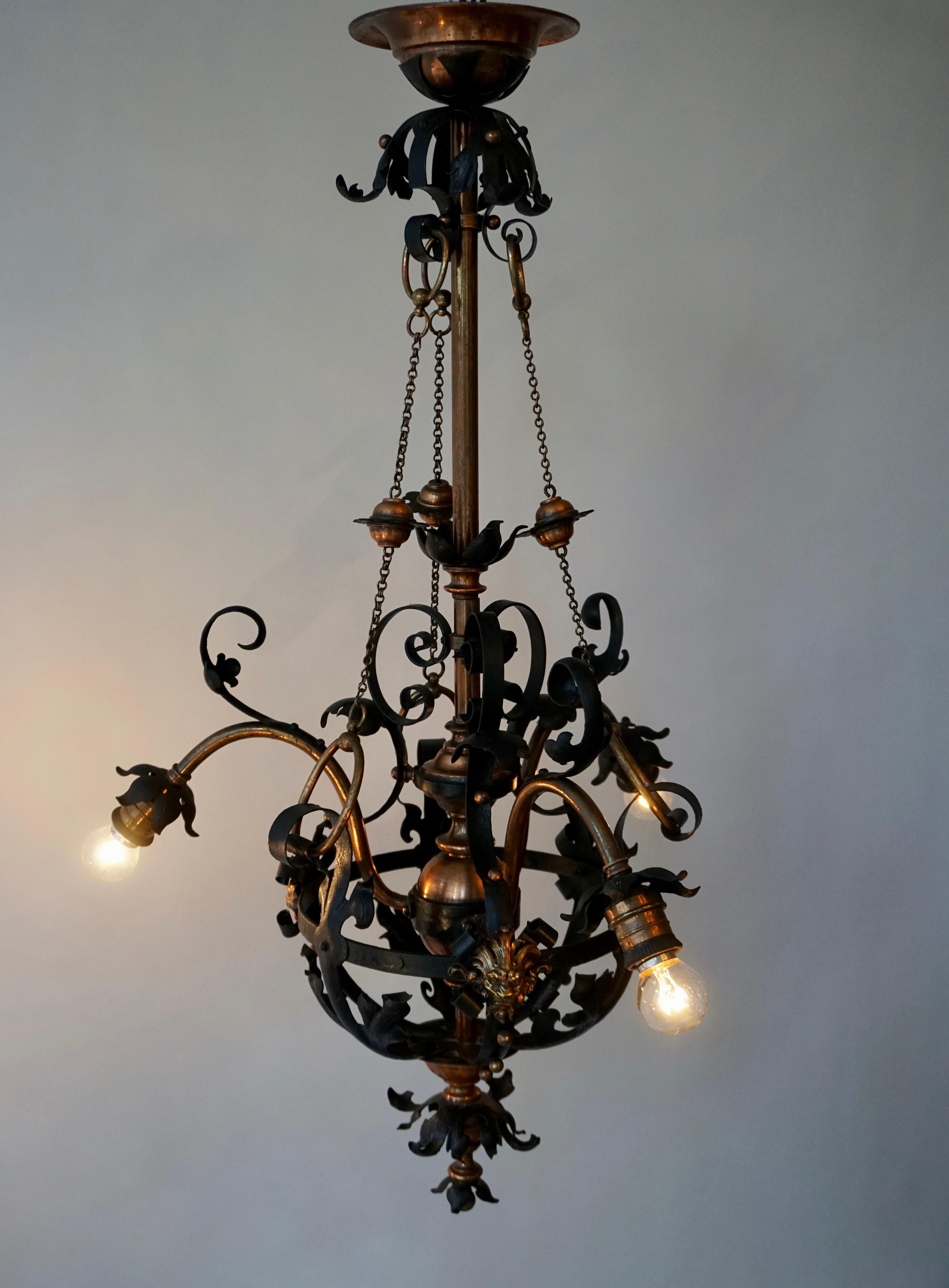Arts & Crafts Wrought Iron and Copper Castle Chandelier with Bronze Lion Heads For Sale 9