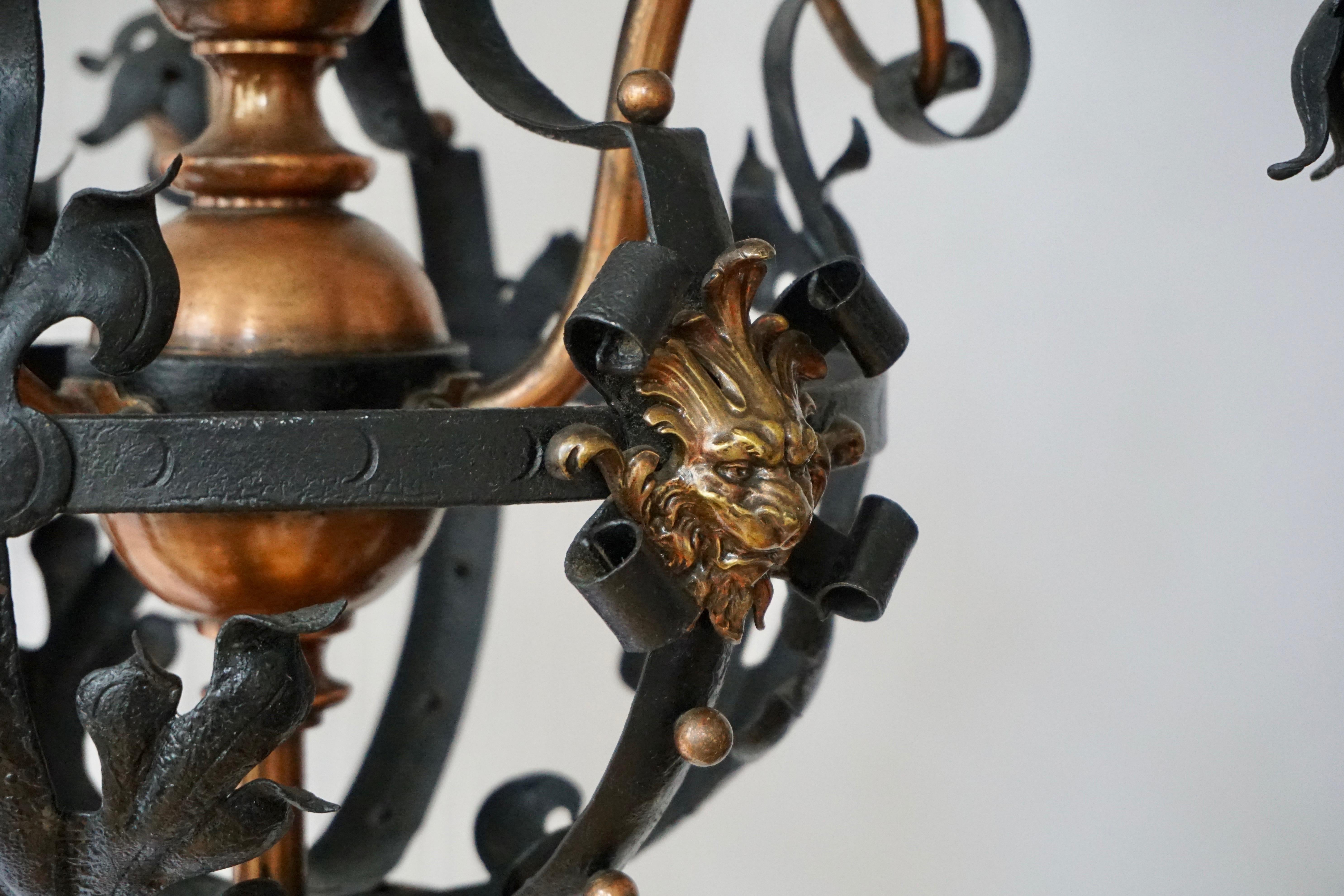 Arts & Crafts Wrought Iron and Copper Castle Chandelier with Bronze Lion Heads In Good Condition For Sale In Antwerp, BE