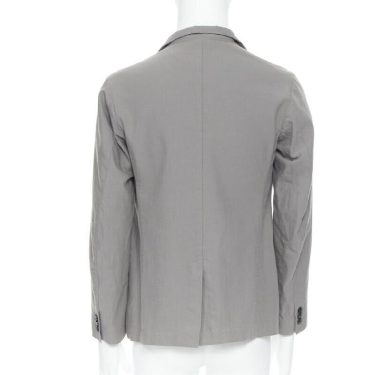Uomo ARTS & SCIENCE giacca blazer grigia in misto cotone a 4 bottoni con collo corto JP2 in vendita