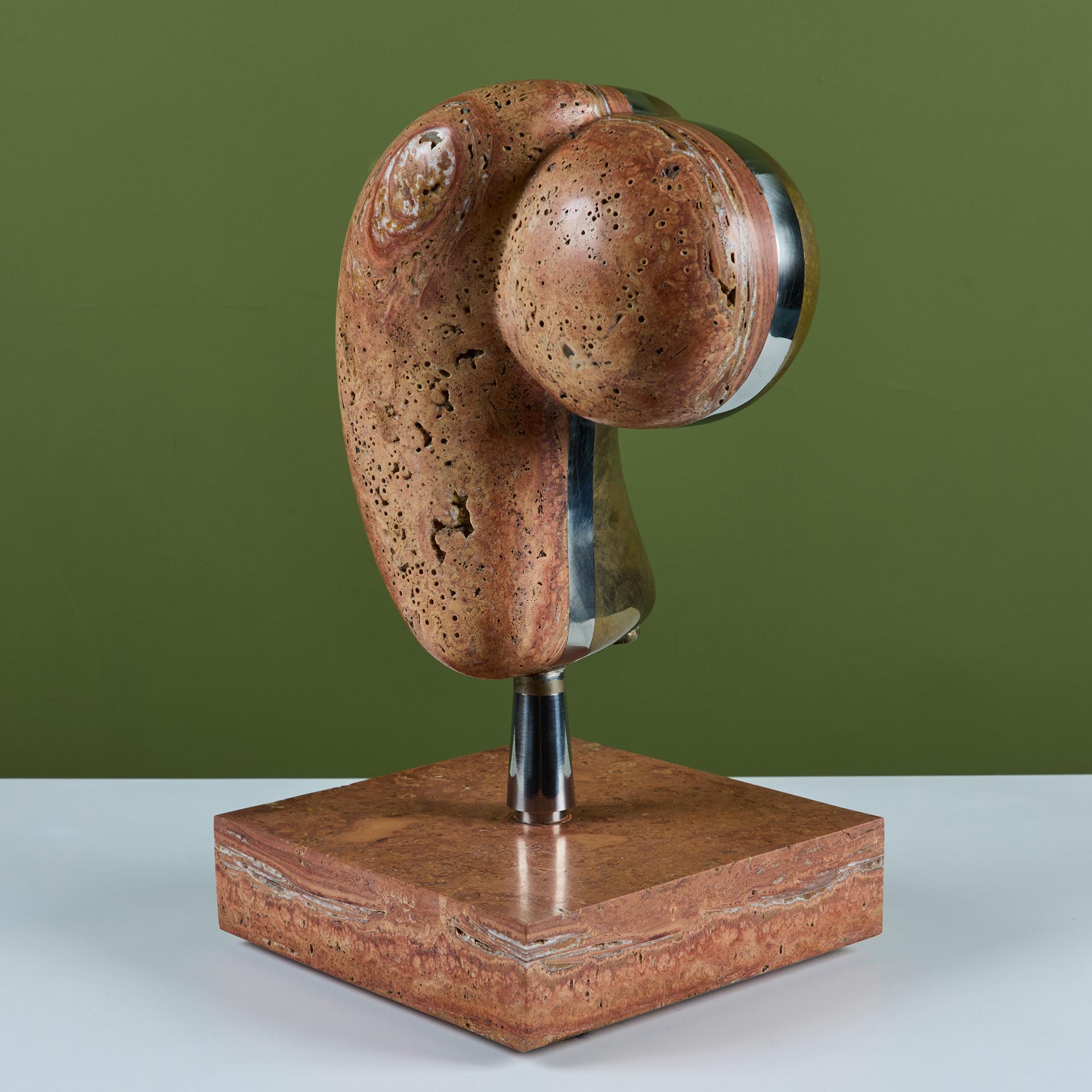 Mixed medium sculpture by Italian artist, Arturo Di Modica. This piece titled 'Love is Life' showcases three materials; red marble, stainless steel and bronze, all on a thick polished red marble base. 

Di Modica's most notable work, the 'charging