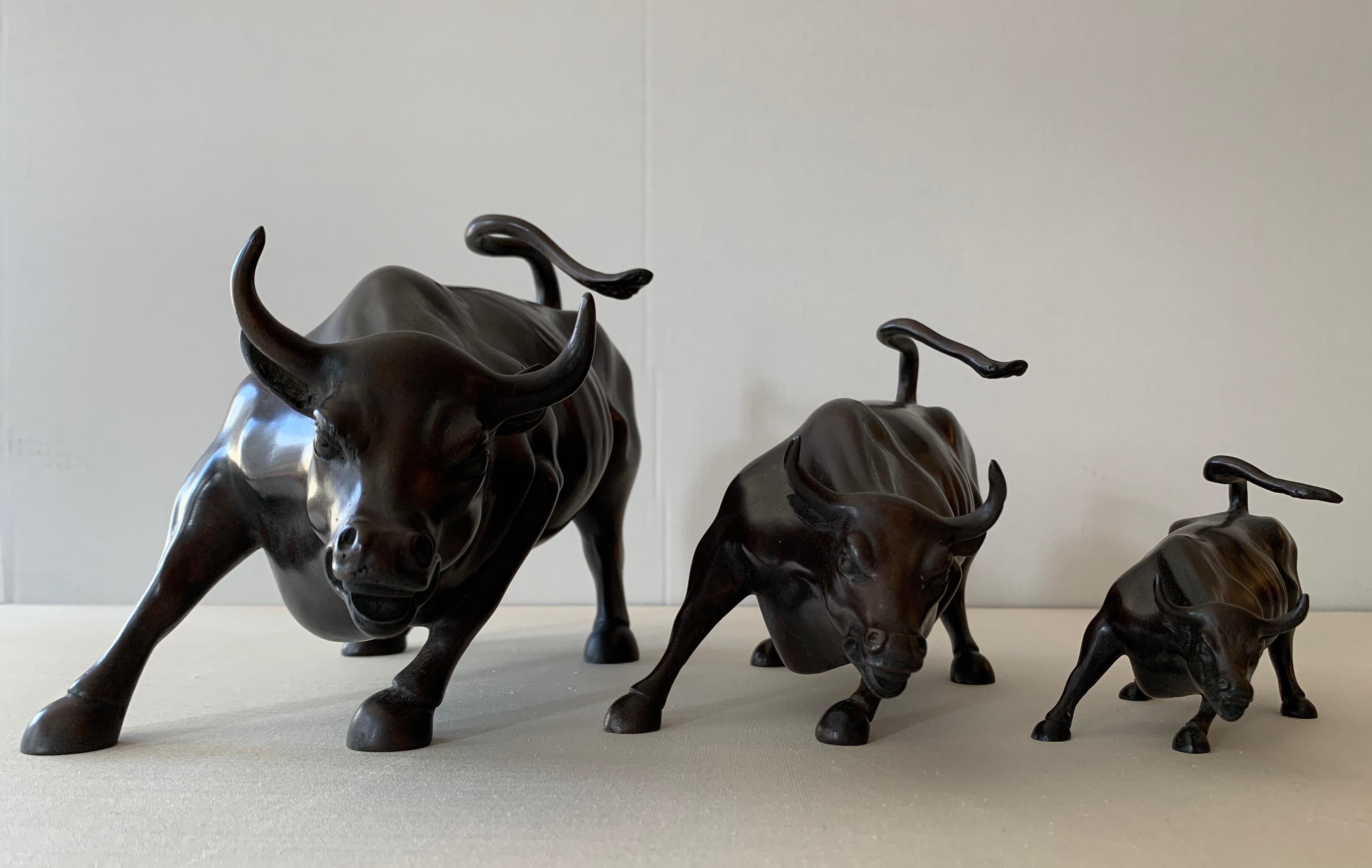 Arturo Di Modica Figurative Sculpture - Wall Street Bulls Bronze Sculptures (Set of 3)