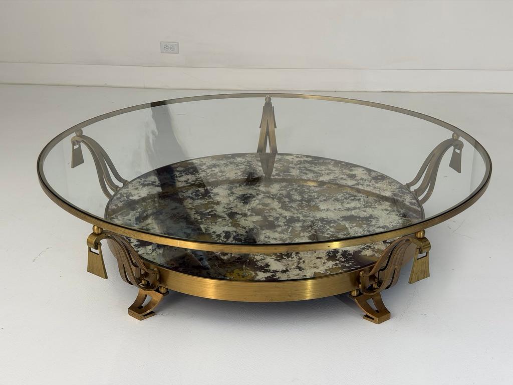An exceptional circular cocktail table designed by Arturo Pani in Mexico City, circa 1950s. This finely detailed design exemplifies Pani’s distinctive interpretation of Hollywood Regency elegance filtered through Mexican Modernism. The table