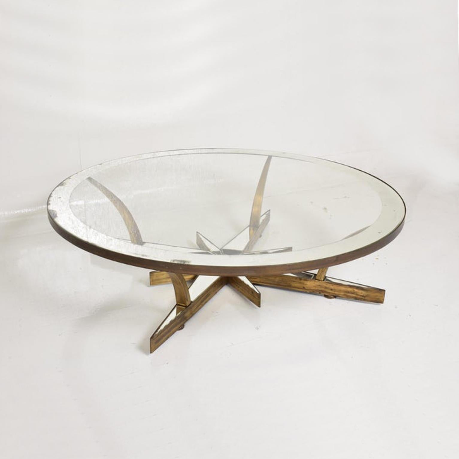 AMBIANIC presents:
Super Quality Modern STAR Coffee Cocktail Table attributed to Arturo Pani Mexico 1950s.
In Heavy Glass and Brass.
Designed with spectacular center base STAR symbol. Show stopping statement.
Unmarked.
Original antique mirror