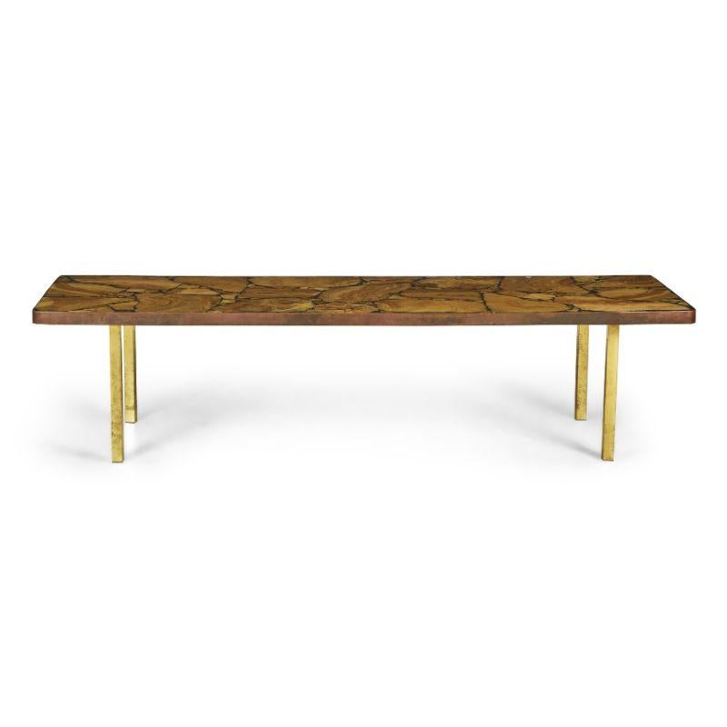 Mexican Mid-Century Modern (circa 1950) rectangular coffee table with an onyx stone and resin top resting on four square brass legs. (ARTURO PANI FOR MULLER OF MEXICO)
