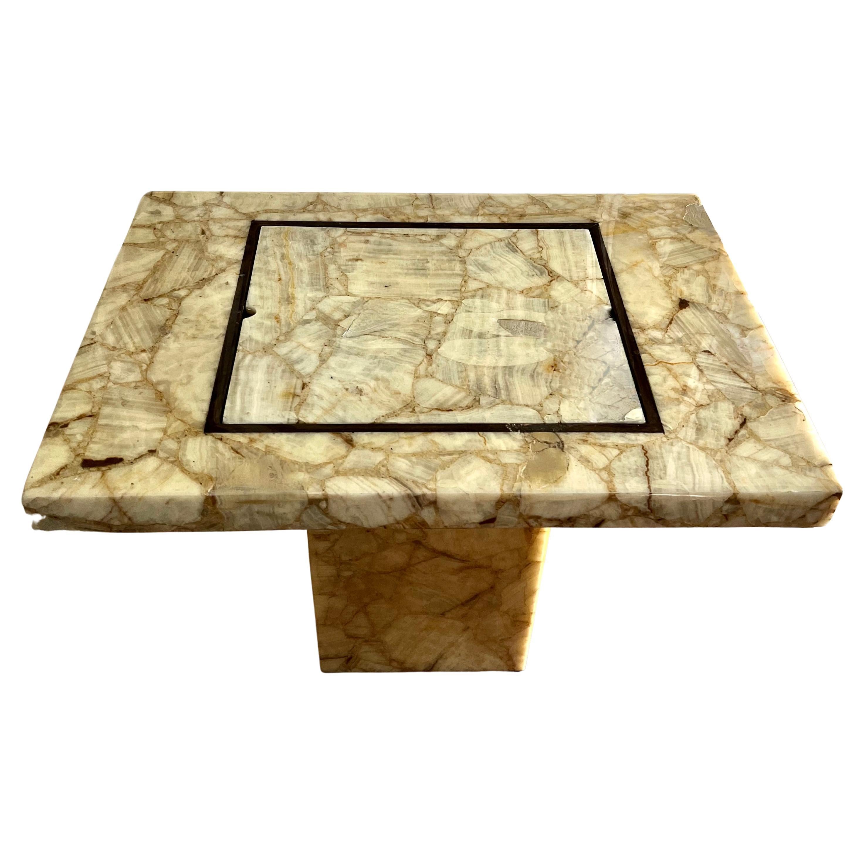 A very special and rare game table by Arturo Pani for Mueller's of Mexico. The piece was manufactured in the 1960's and is all hand crafted. The Onyx has a thick resin coating that gives the piece a very deep shine and protects it from elements.