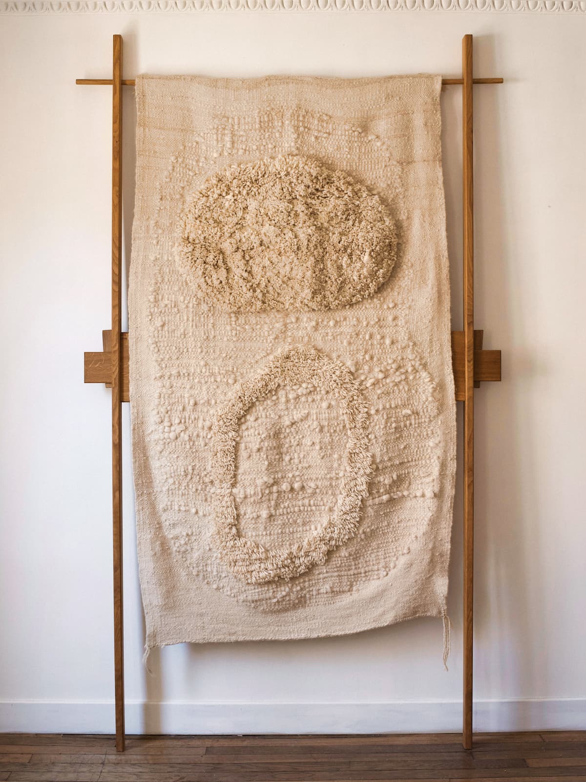 - Hand-spun and hand-woven wool tapestry 
- 2020
Dimensions: 
250 H x 145 W CM
98.4 H x 57 W IN

MADE IN COLLABORATION WITH ODU WORKS
EDITION OF 3 + 1 ARTIST’S PROOF
WOOD FRAME BY ELOI SCHULTZ

This textile wall piece is the result of a