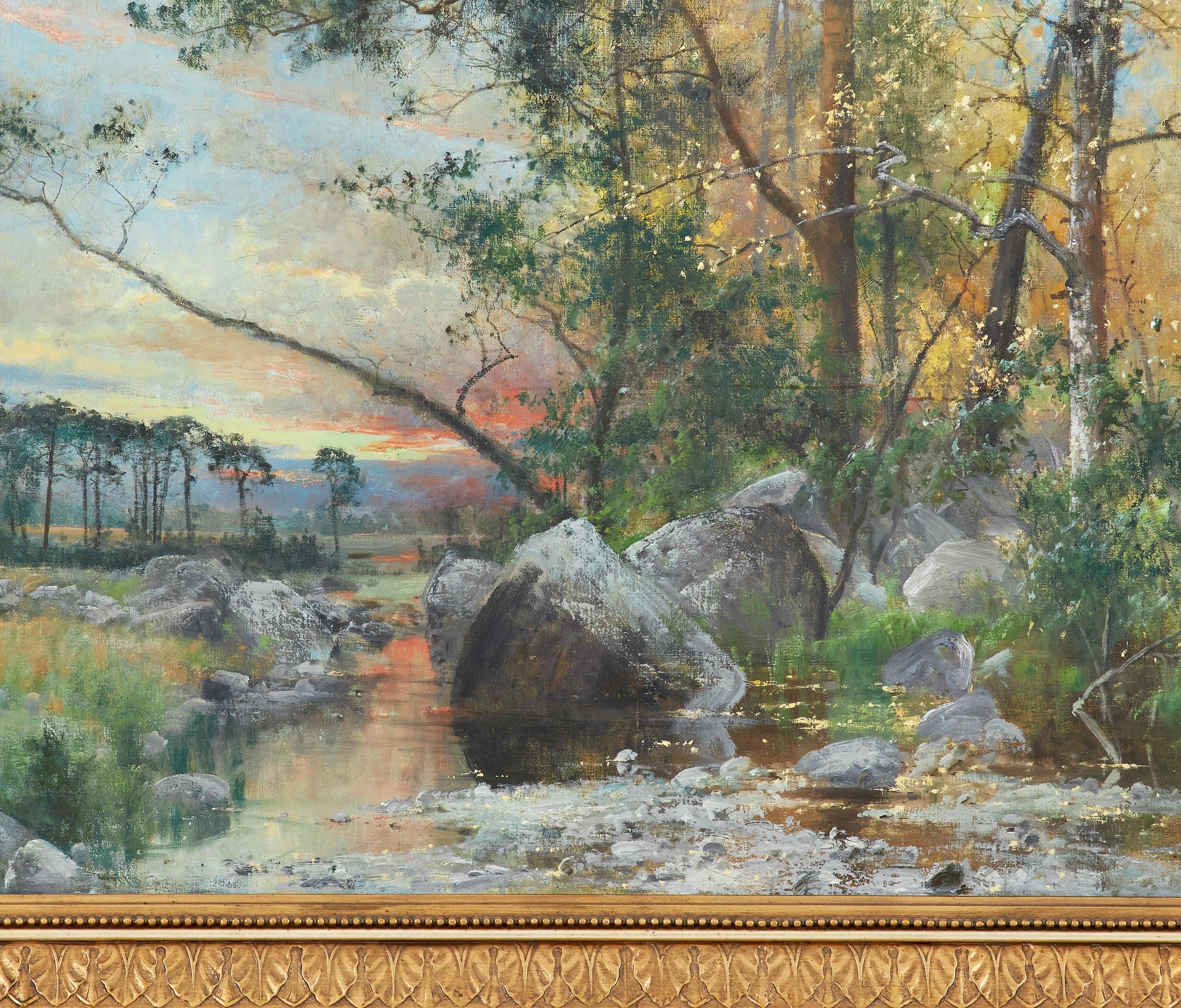 Arvid Mauritz Lindström (1849–1923) – Fall Landscape
The painting presents a vast autumn landscape illuminated by the soft glow of a setting sun. At the center, a stream winds its way toward the horizon, its clear waters carrying golden-yellow