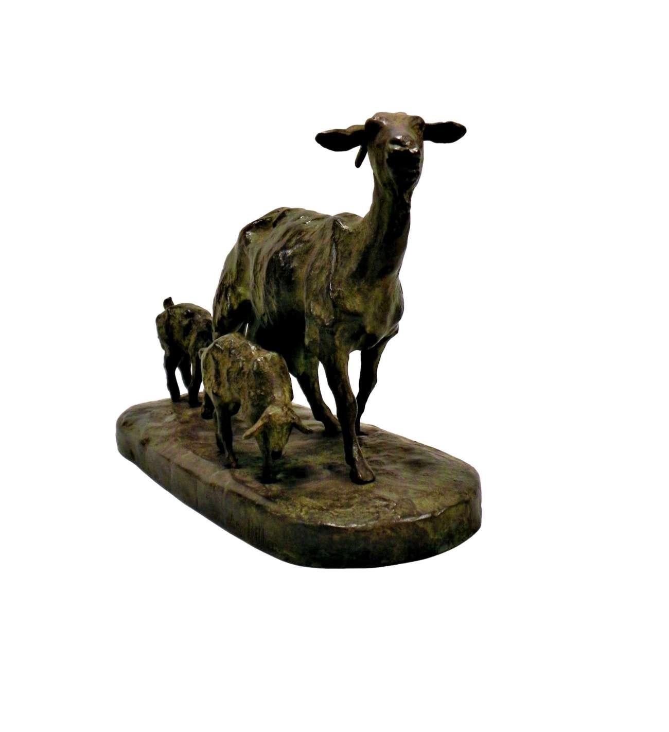 Fine quality Bronze Goat statue by the esteemed French sculptor Ary Bitter (1883-1973), depicting a mother goat tenderly accompanied by her two young kids. This charming and rather rare subject is expertly rendered in patinated bronze, showcasing a