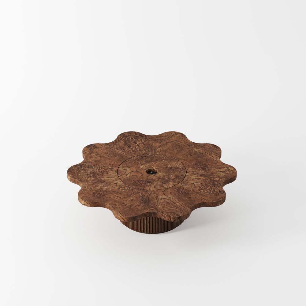 A calmy and cosy coffee table in fluted oak
This Ary coffee table reminds the Art Deco influence of its designer Emmanuelle Simon with its round and angular curves celebrates the raw materials of oak and art deco, organic shapes.

This solid wood