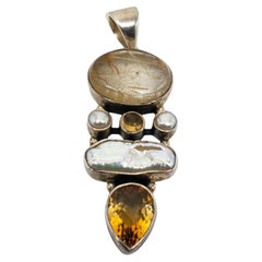 ARYA Sterling Silver Rutilated Quartz Pendant #20400 ARYA Sterling Silver Rutilated Quartz Pendant #20400