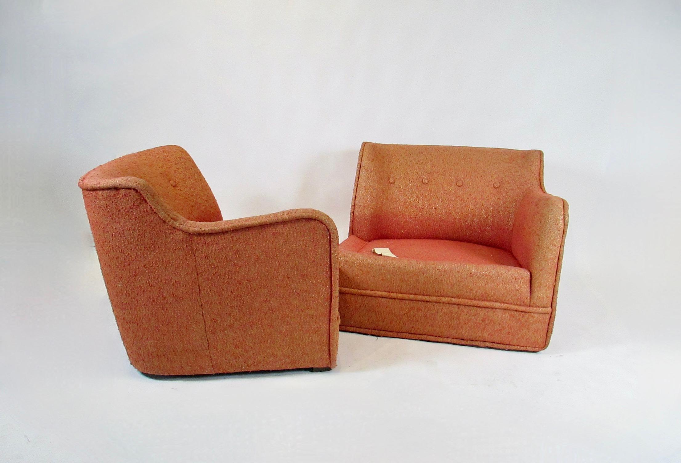 Pair of 1940s lounge chairs . Solid frames both chairs need to be re upholstered . Sold as is hoping to save future client the cost of re doing my upholstery . Pair of  sensually curved 1940s chairs that work well together as a settee .  No seat