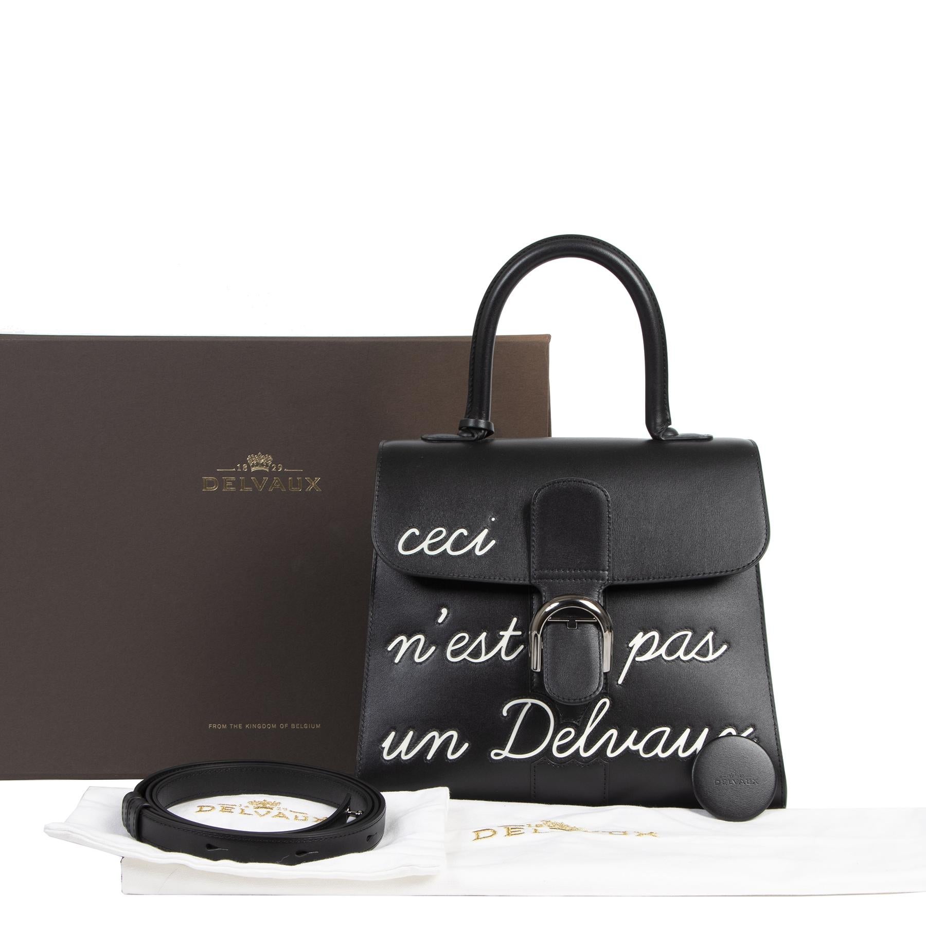 Never worn

As New Delvaux L'Humour Brillant MM 