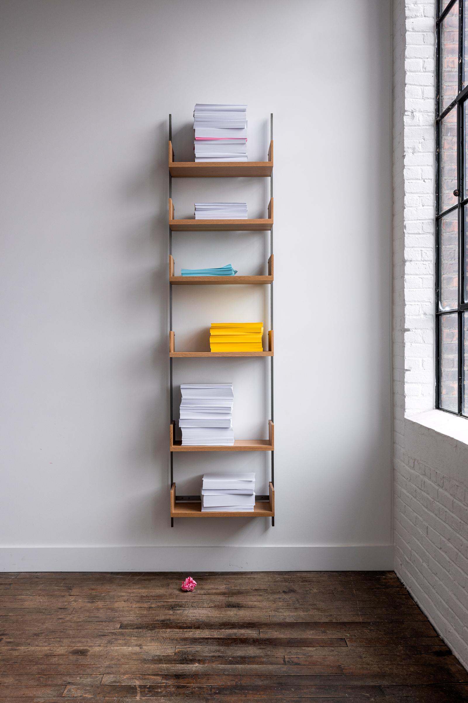 The AS4 modular shelving unit is handmade using solid hardwood with dovetail joinery, and solid steel.  This single-bay shelving unit can easily be rearranged, expanded upon, and relocated - adapting to your needs as they change (unlike traditional